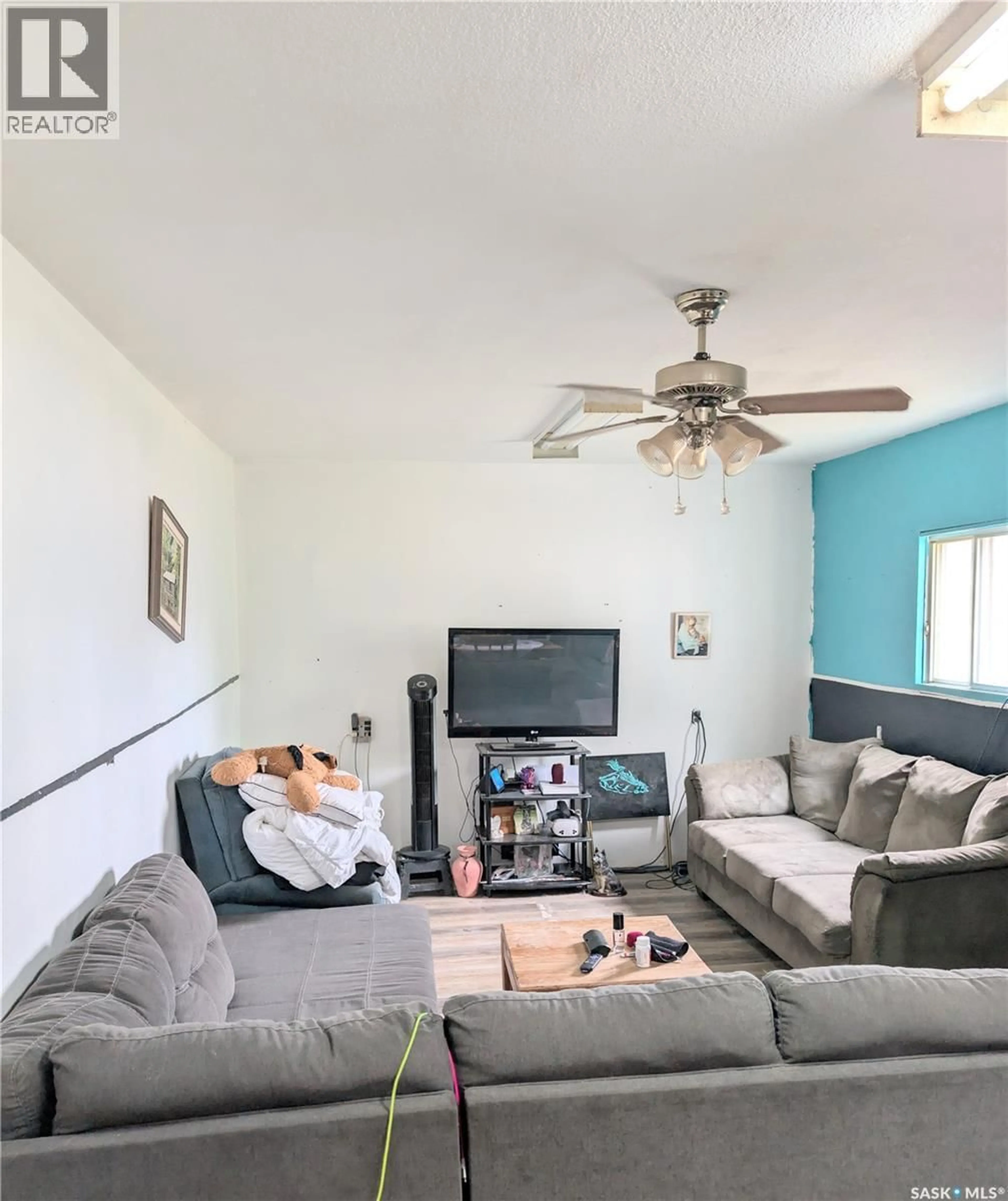 Living room with furniture, unknown for 439 4TH STREET, Shaunavon Saskatchewan S0N2M0