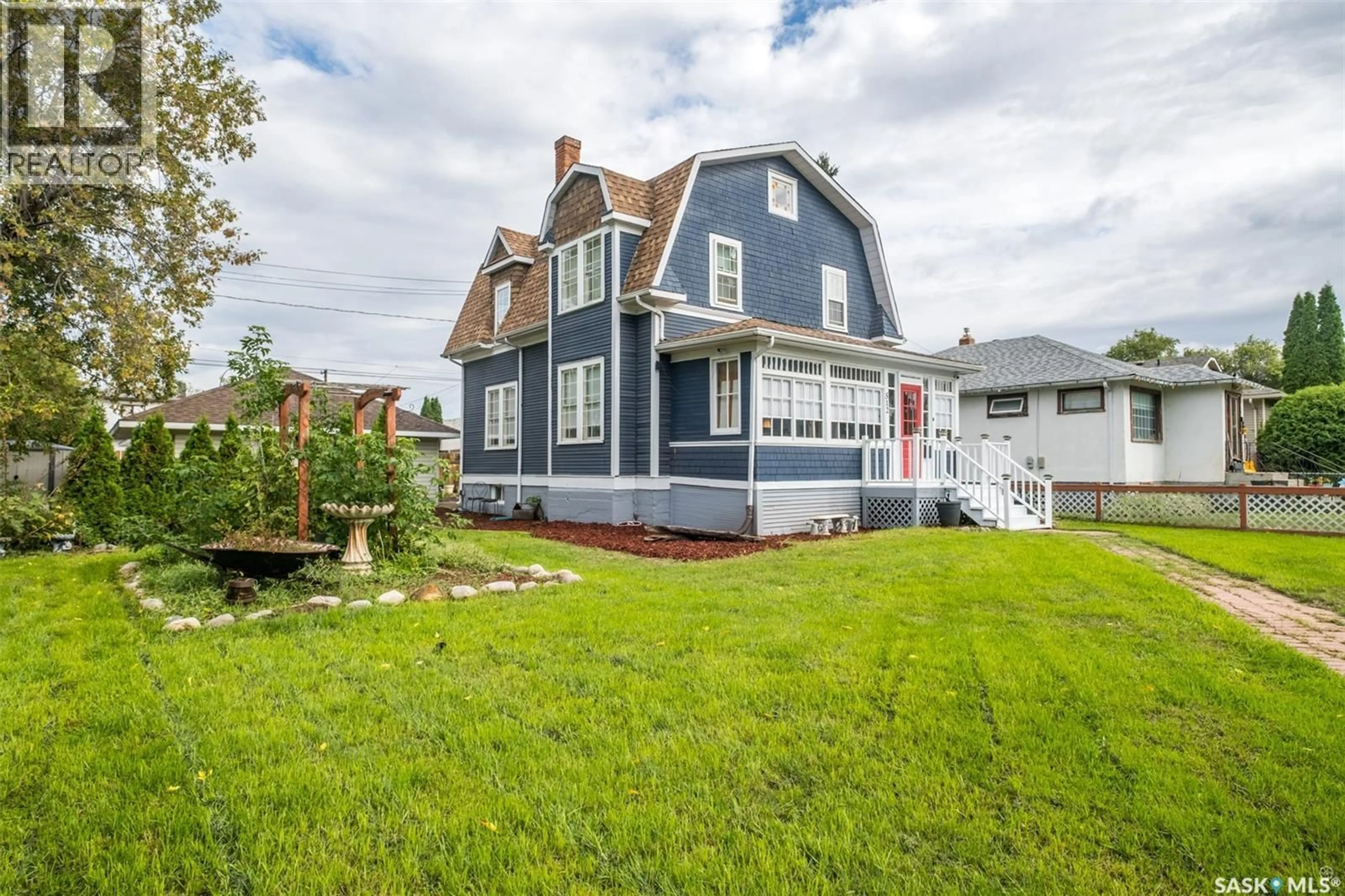 Home with vinyl exterior material, street for 512 12TH STREET, Prince Albert Saskatchewan S6V3C2