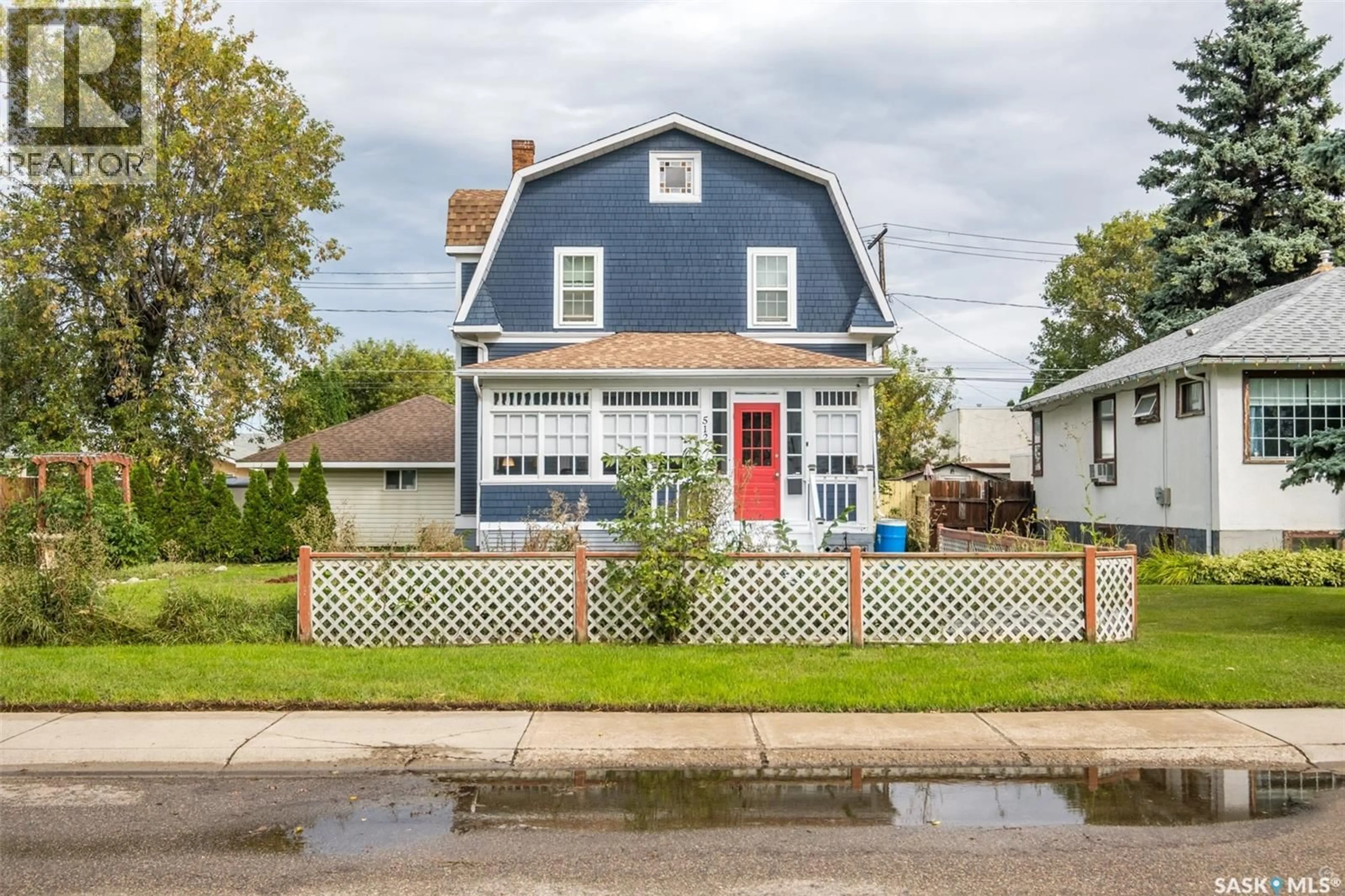 Home with vinyl exterior material, street for 512 12TH STREET, Prince Albert Saskatchewan S6V3C2