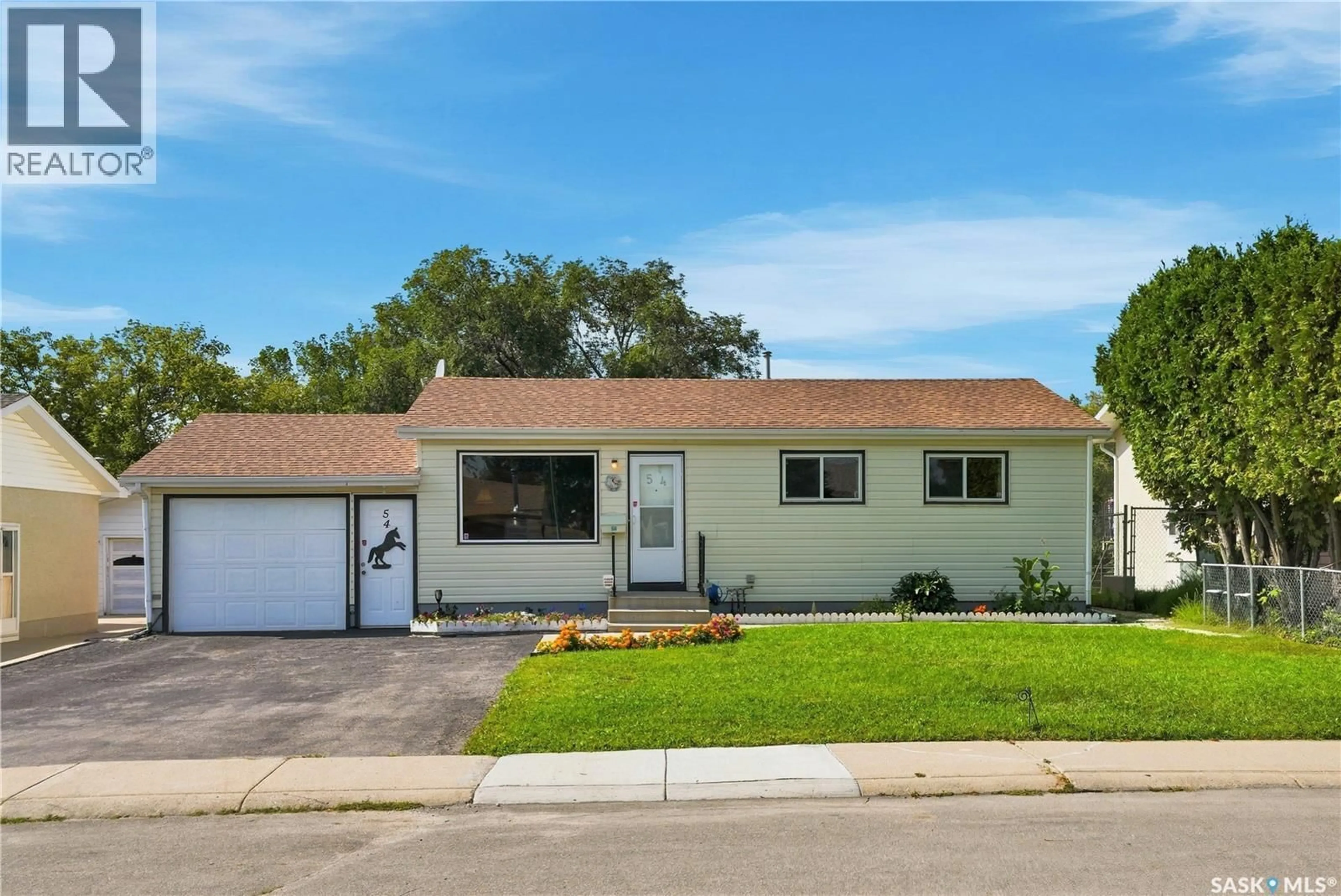 Home with vinyl exterior material, street for 54 KLAEHN CRESCENT, Saskatoon Saskatchewan S7L4G5