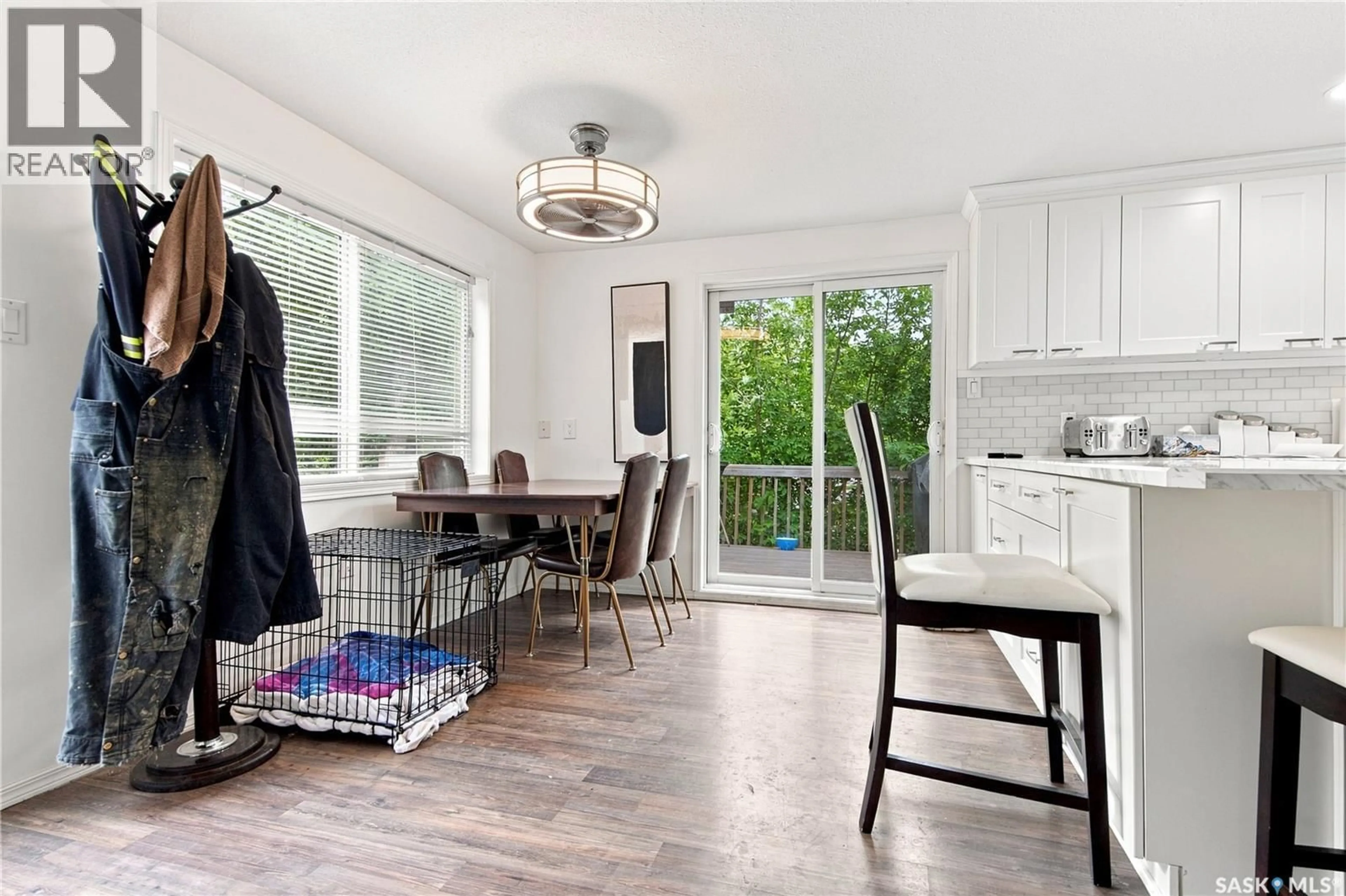 Open concept kitchen, wood/laminate floor for 206 ALBERT STREET, Manitou Beach Saskatchewan S0K4T1