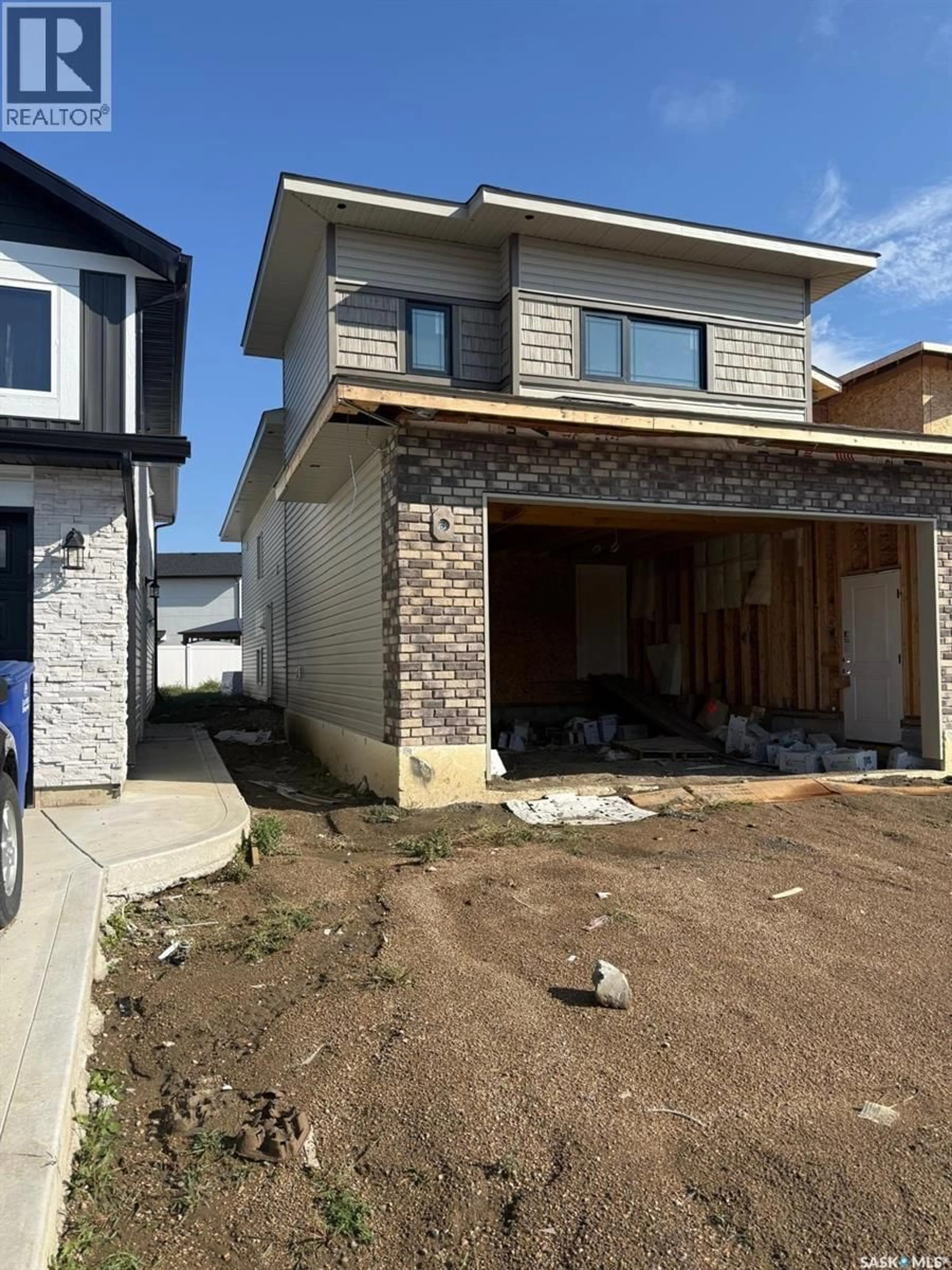 Home with brick exterior material, street for 1174 NIGHTINGALE TERRACE, Saskatoon Saskatchewan S7L7R6