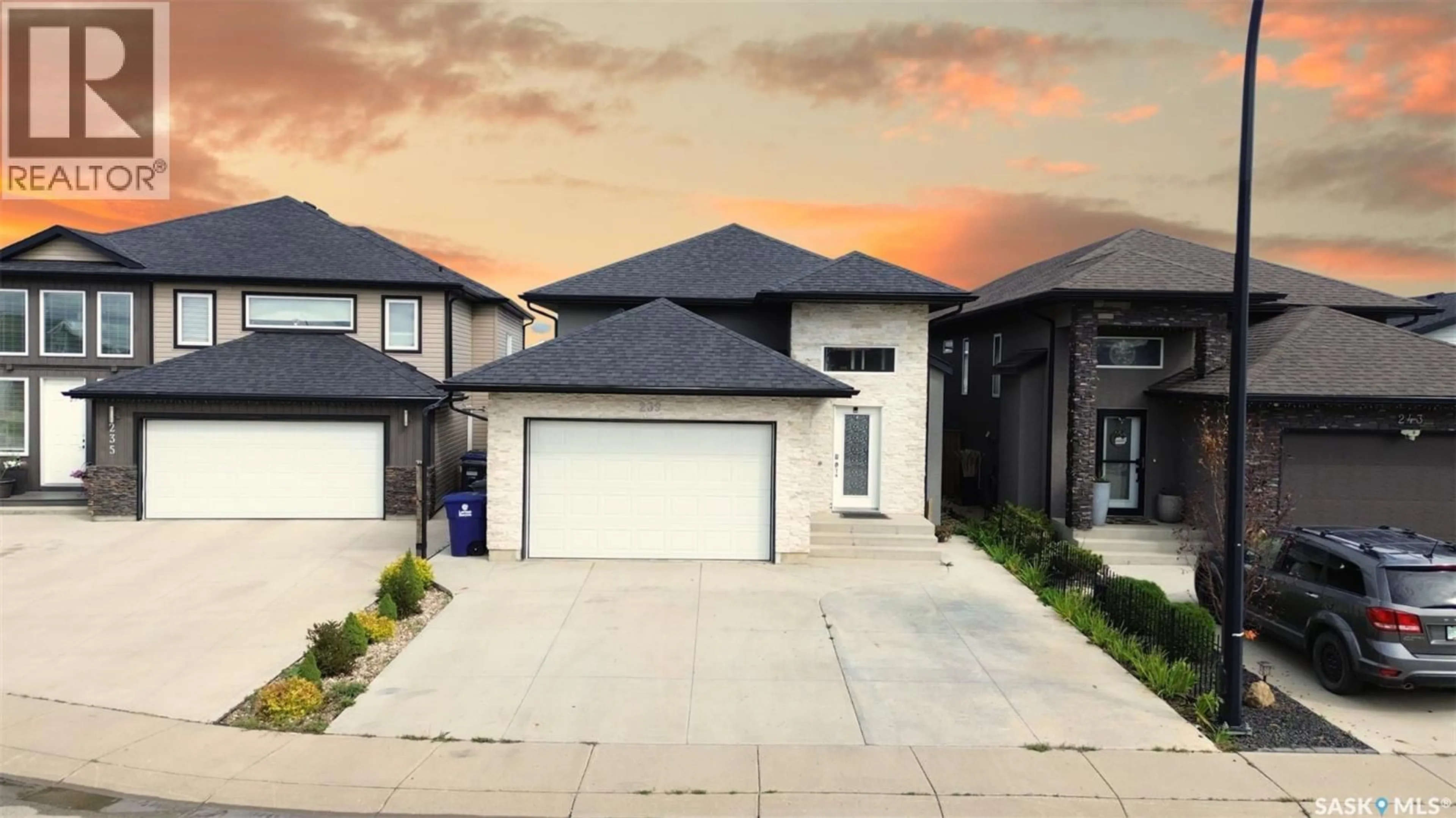 A pic from outside/outdoor area/front of a property/back of a property/a pic from drone, street for 239 BENTLEY COURT, Saskatoon Saskatchewan S7L6L4