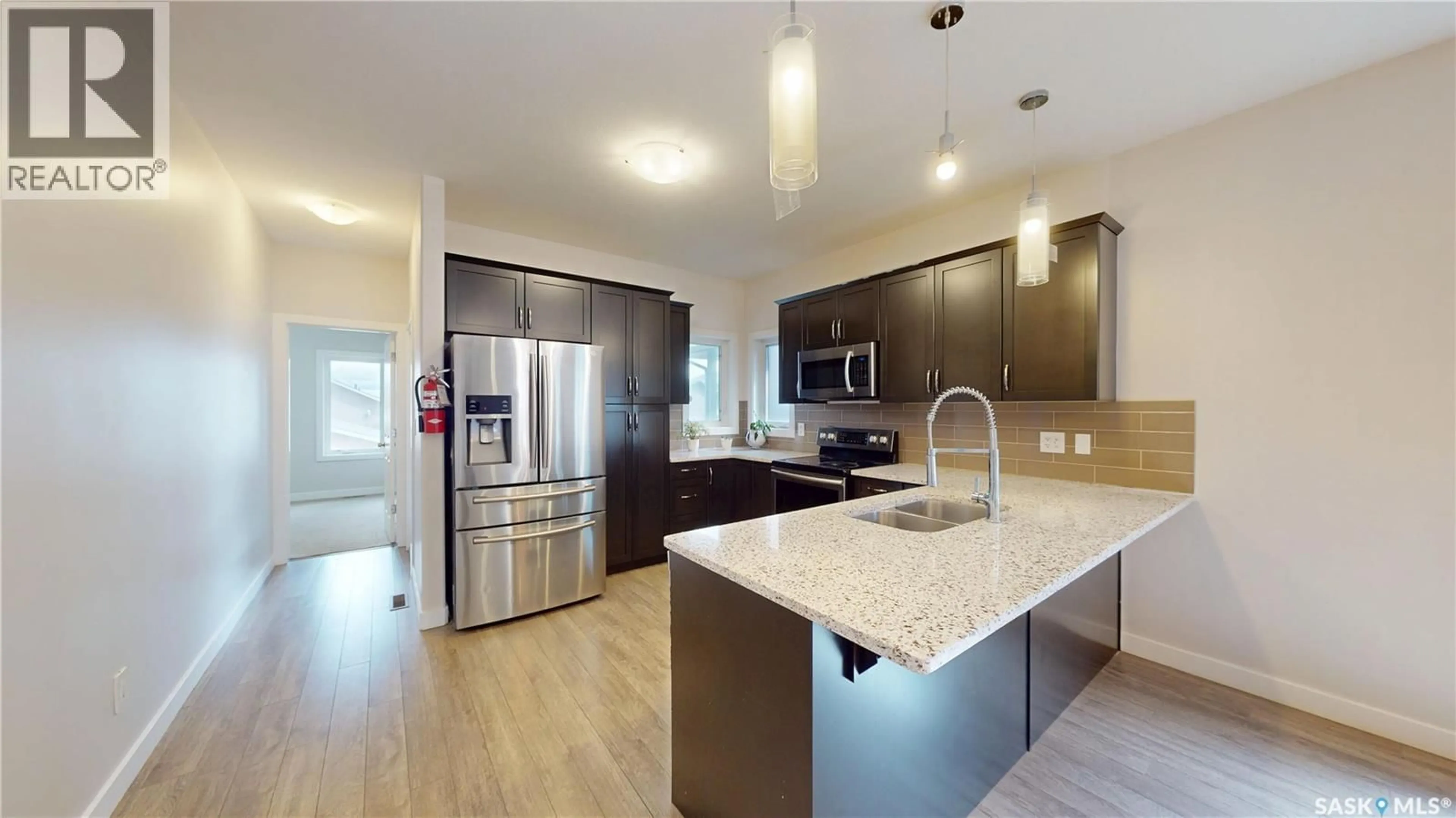 Open concept kitchen, unknown for 239 BENTLEY COURT, Saskatoon Saskatchewan S7L6L4