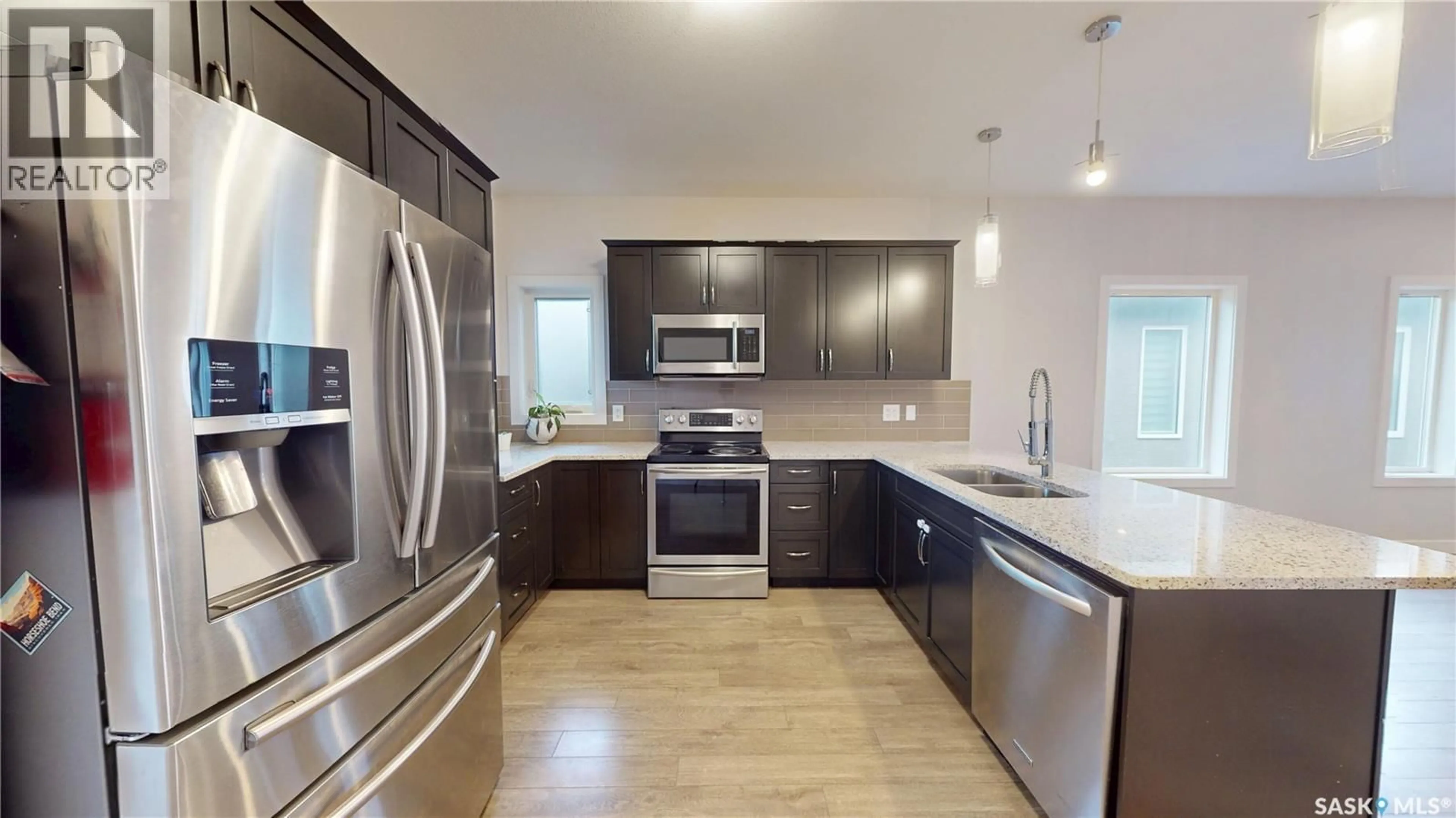 Open concept kitchen, unknown for 239 BENTLEY COURT, Saskatoon Saskatchewan S7L6L4