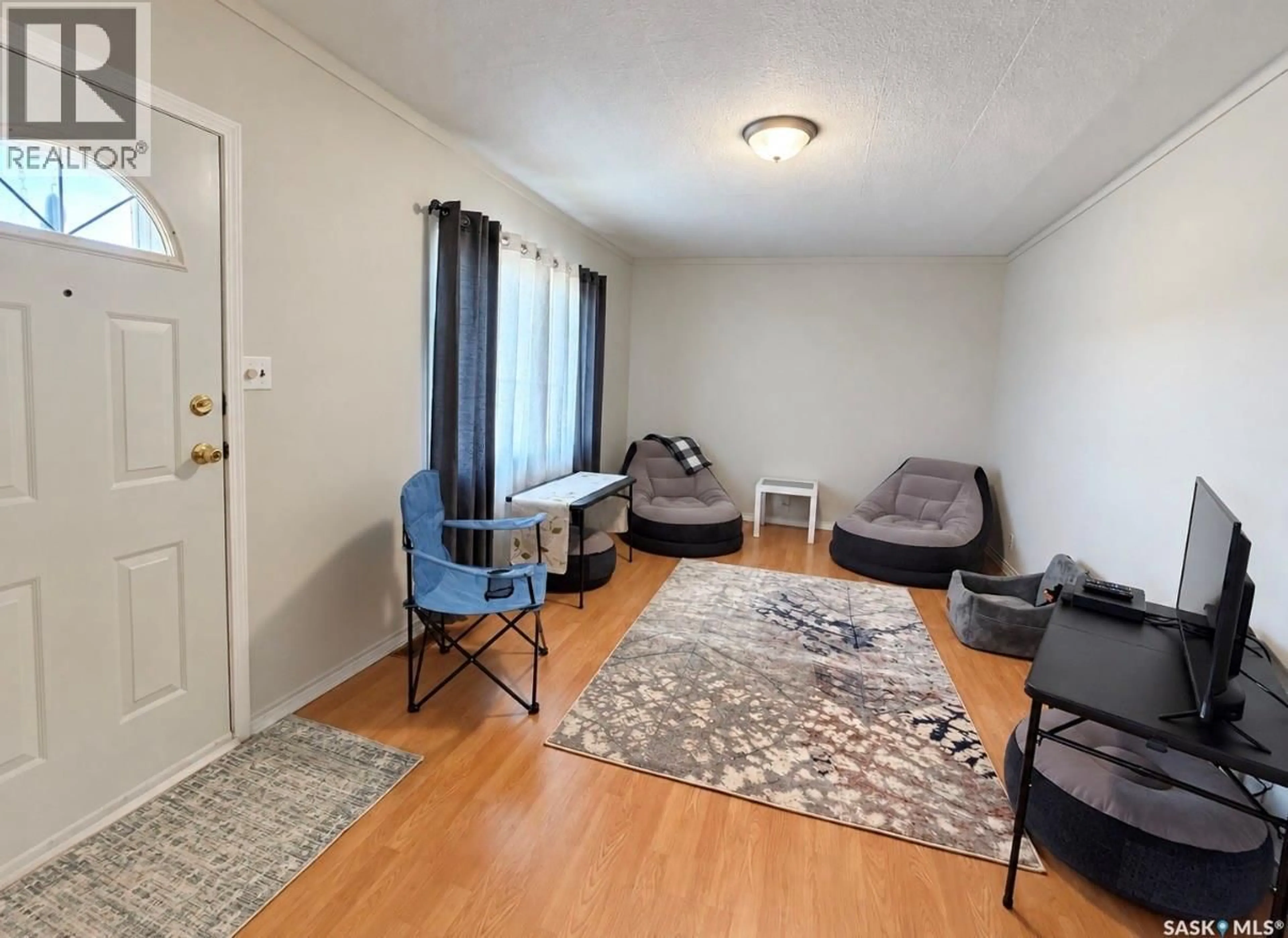 Living room with furniture, unknown for 1228 TAYLOR STREET, Herbert Saskatchewan S0H2A0