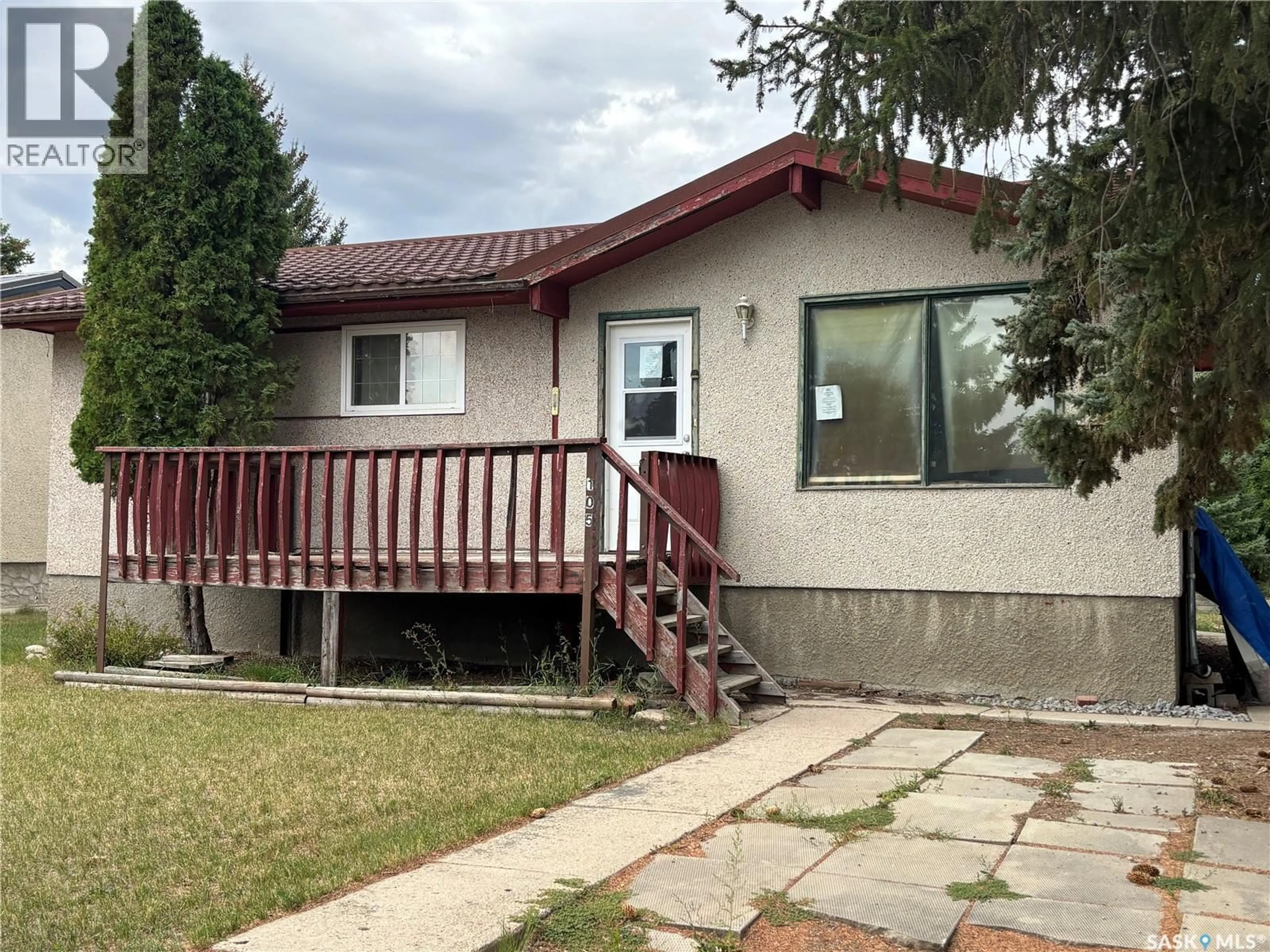 Home with vinyl exterior material, street for 105 GRIFFIN STREET, Maple Creek Saskatchewan S0N1N0