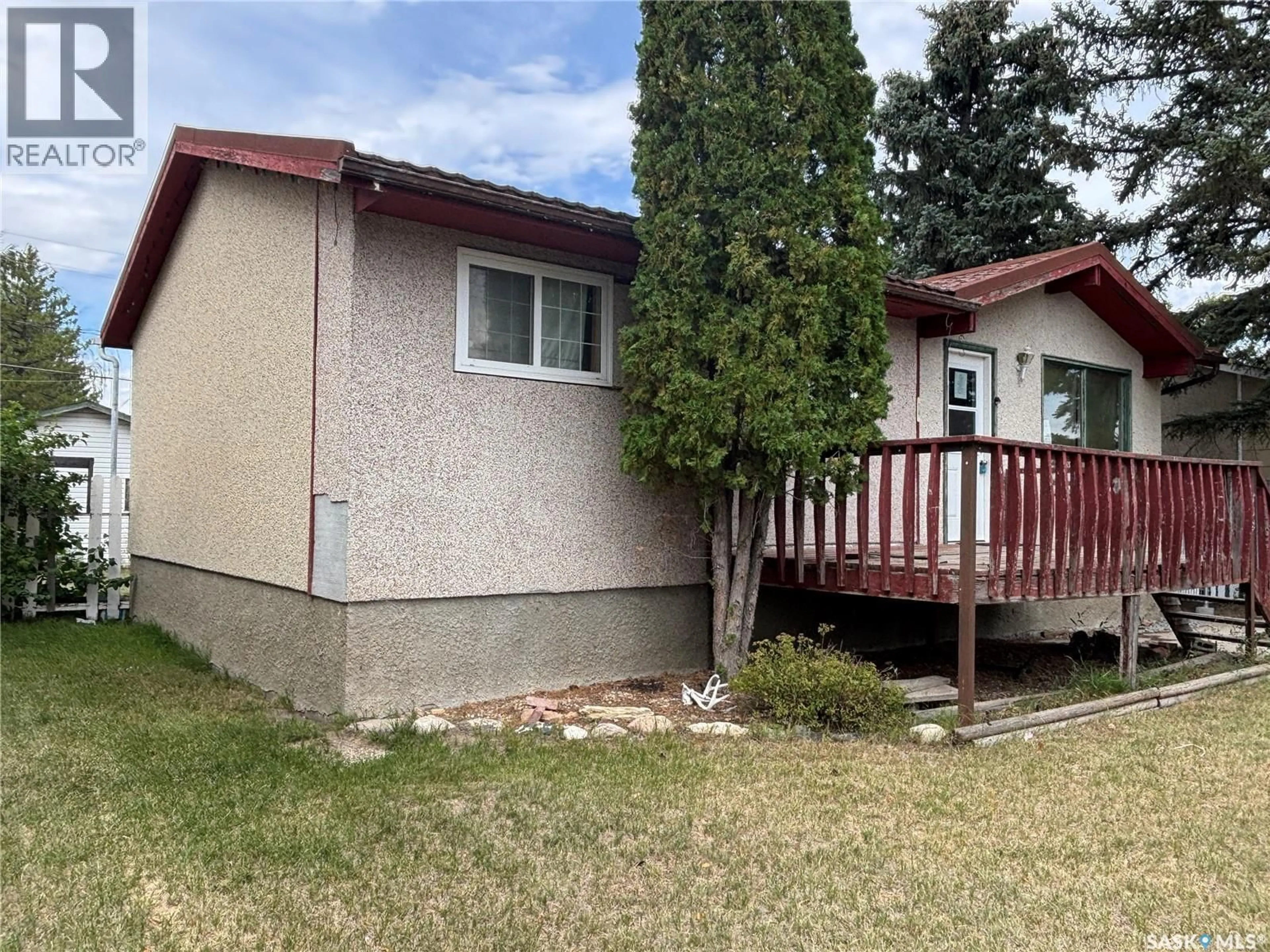 Home with vinyl exterior material, street for 105 GRIFFIN STREET, Maple Creek Saskatchewan S0N1N0