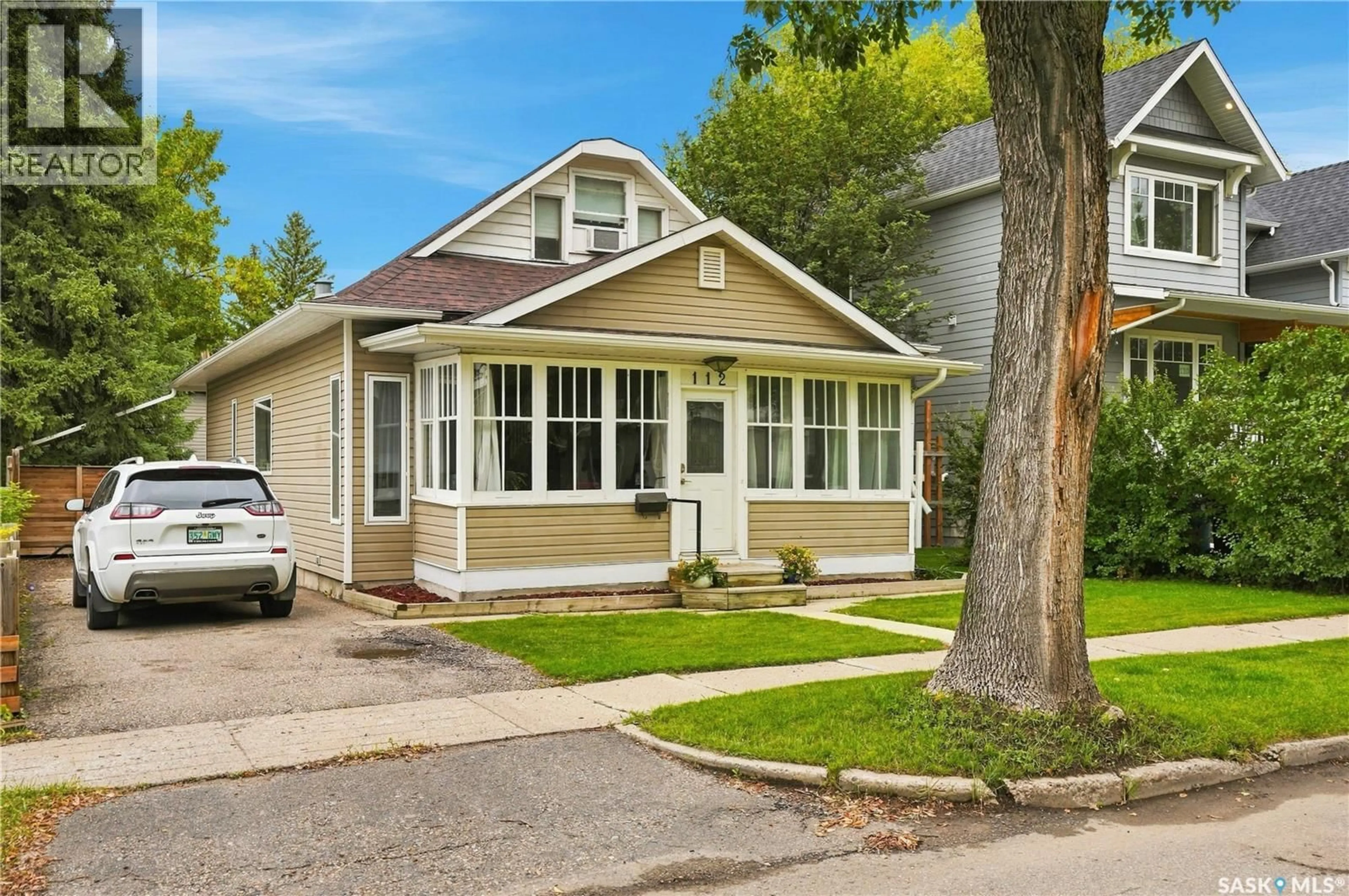 Home with vinyl exterior material, street for 112 112TH STREET, Saskatoon Saskatchewan S7N1T7