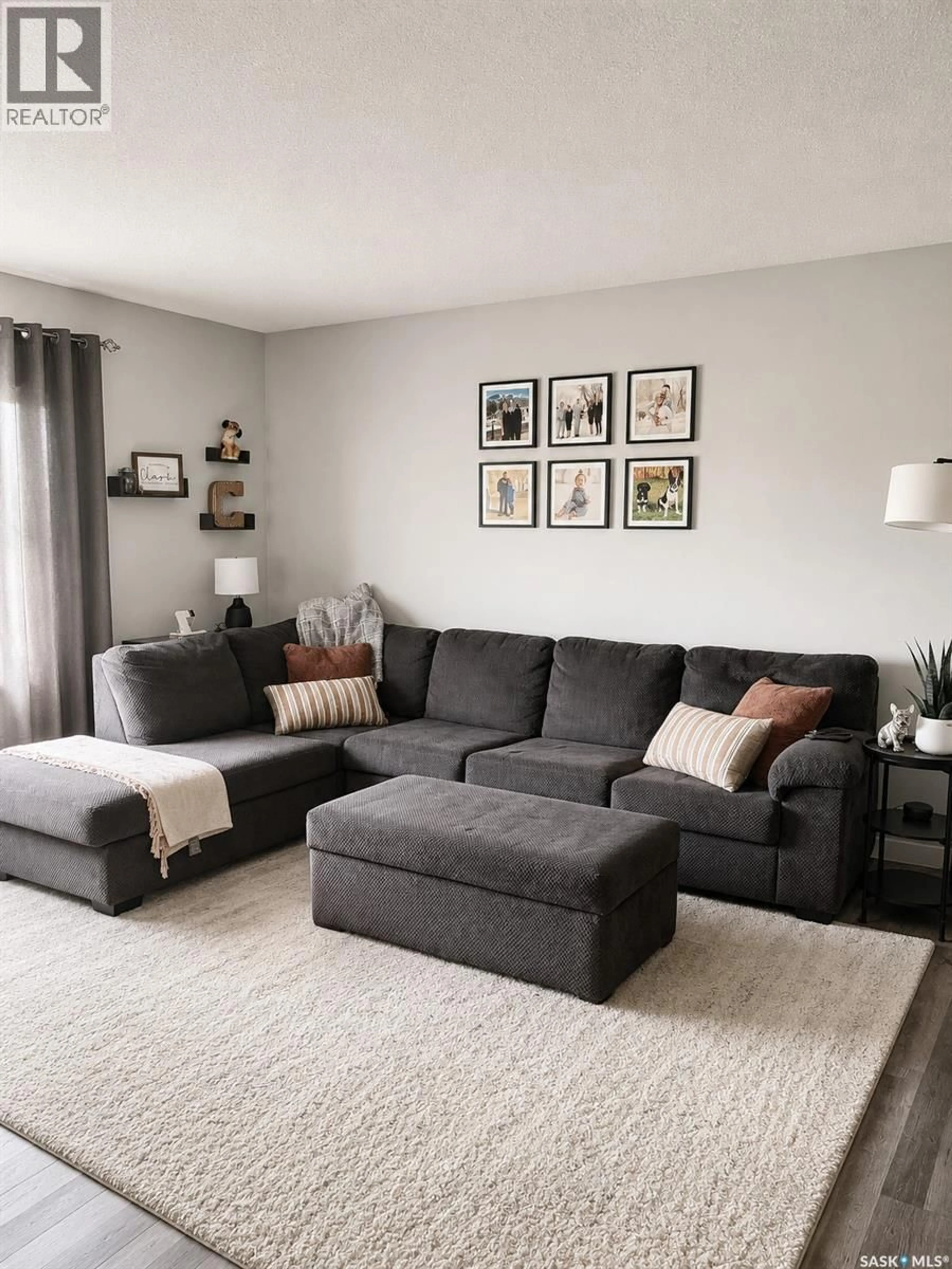 Living room with furniture, carpet floor for 315 HEARN STREET, Outlook Saskatchewan S0L2N0