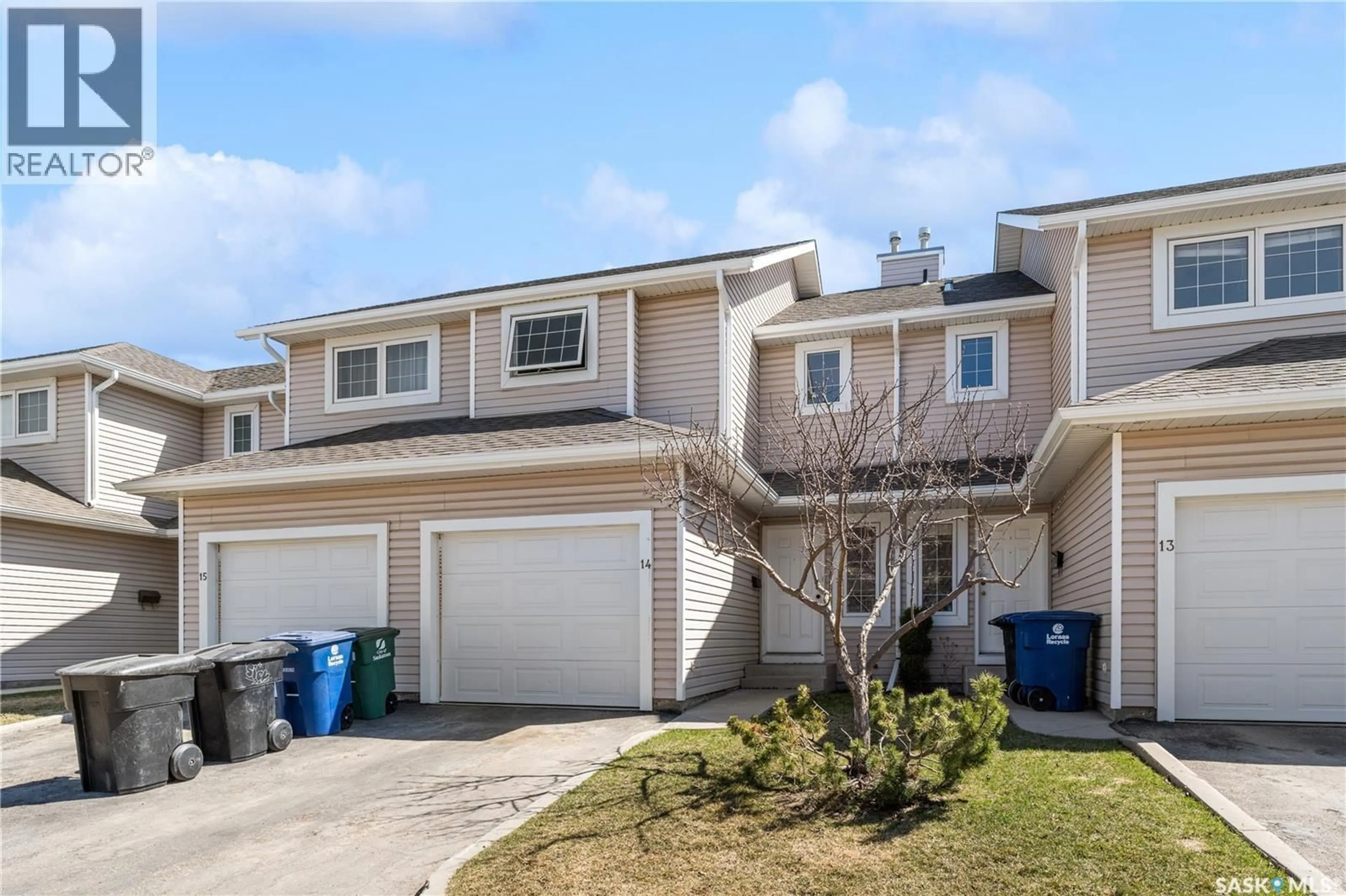 Home with vinyl exterior material, street for 14 103 BERINI DRIVE, Saskatoon Saskatchewan S7N4L2