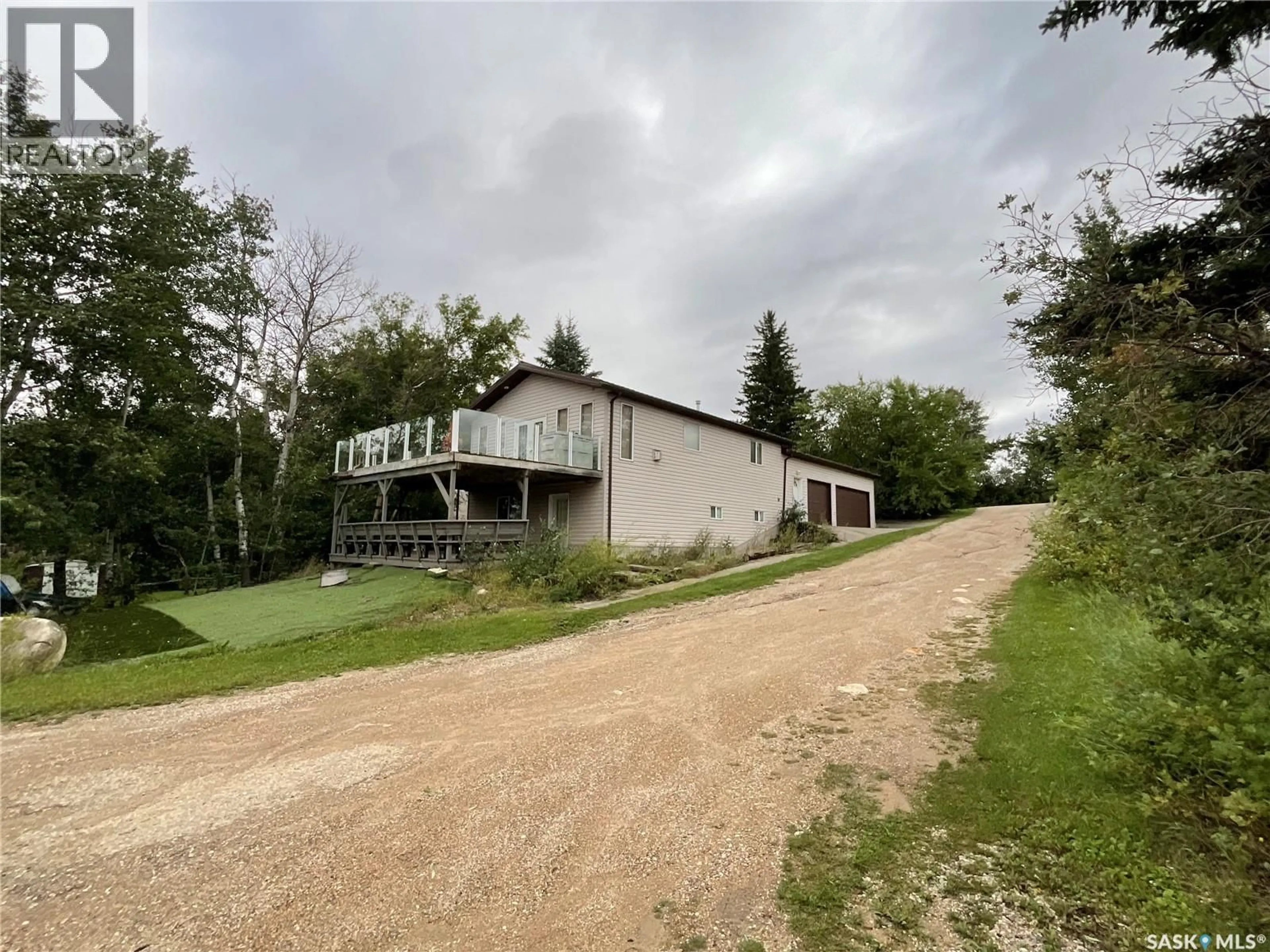 A pic from outside/outdoor area/front of a property/back of a property/a pic from drone, building for 75 CRESCENT AVENUE, Wakaw Lake Saskatchewan S0K4P0