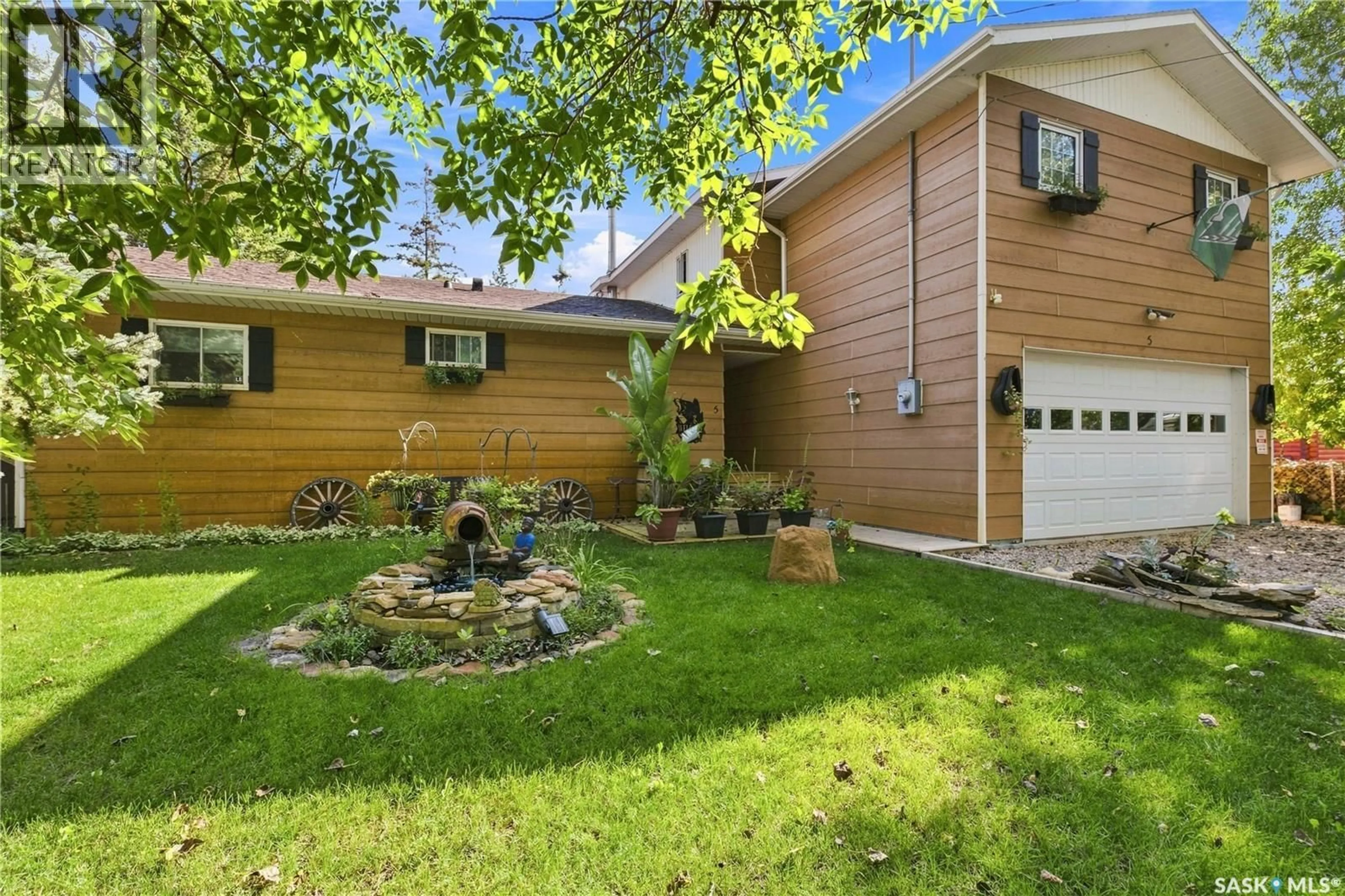 Home with vinyl exterior material, street for 5 ELM AVENUE, Grandview Beach Saskatchewan S0G1C0