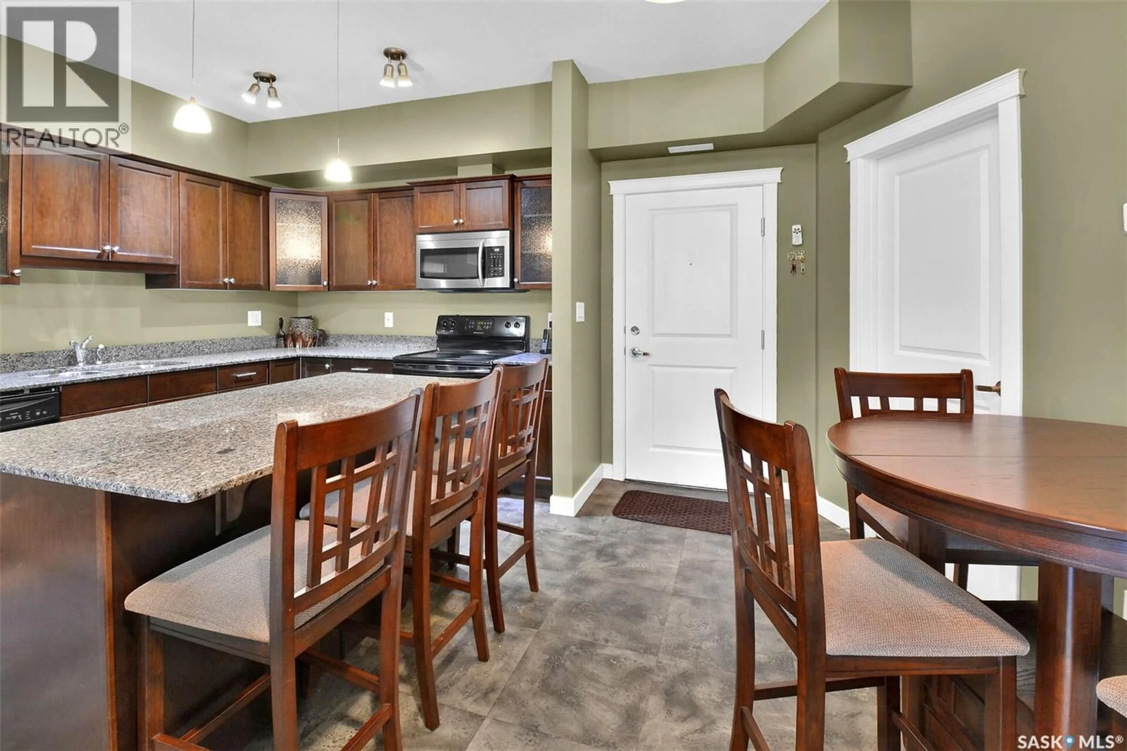 Open concept kitchen, ceramic/tile floor for 205 110 HAMPTON CIRCLE, Saskatoon Saskatchewan S7R0C5