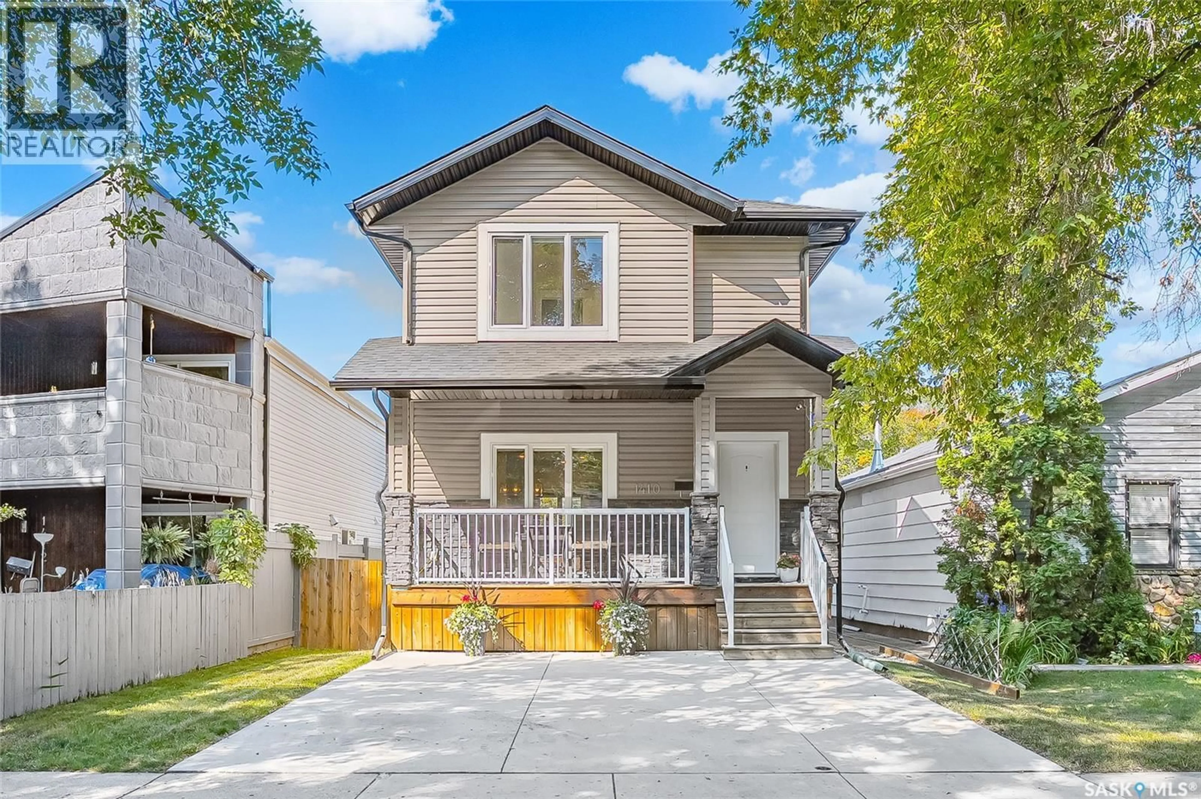 Home with vinyl exterior material, street for 1410 COY AVENUE, Saskatoon Saskatchewan S7M0H4