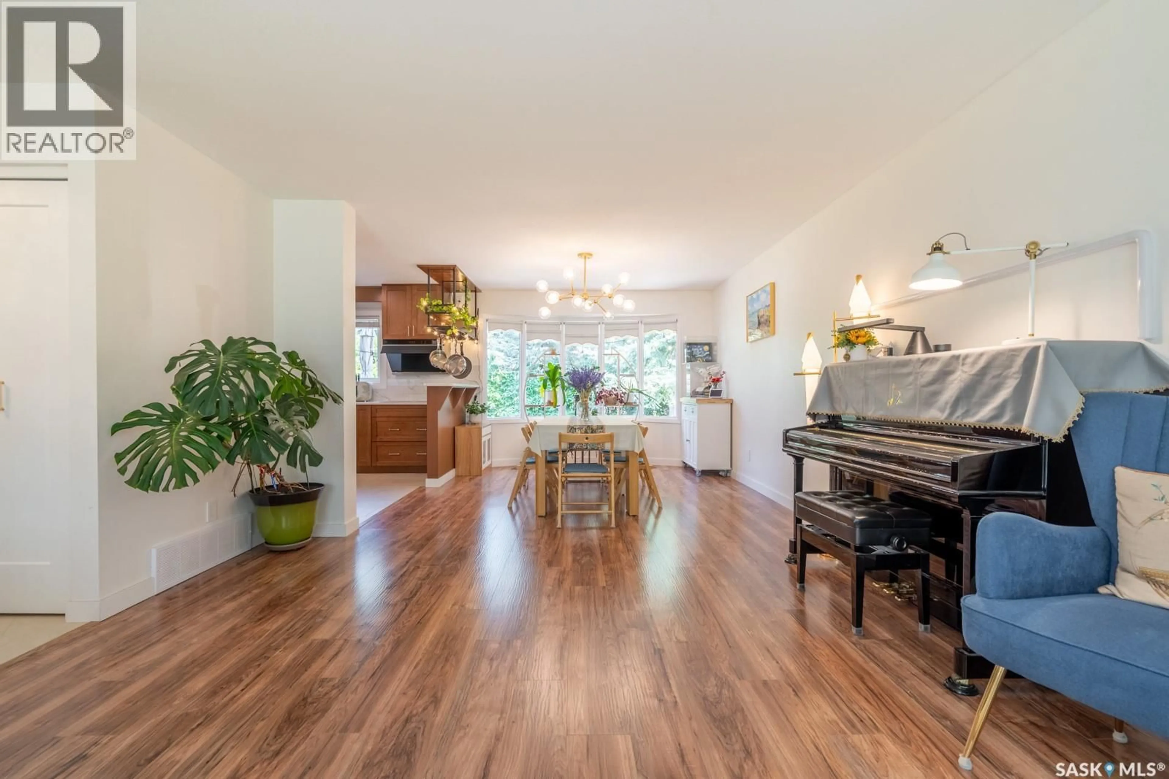 Dining room, wood/laminate floor for 127 ROGERS ROAD, Regina Saskatchewan S4S6T7