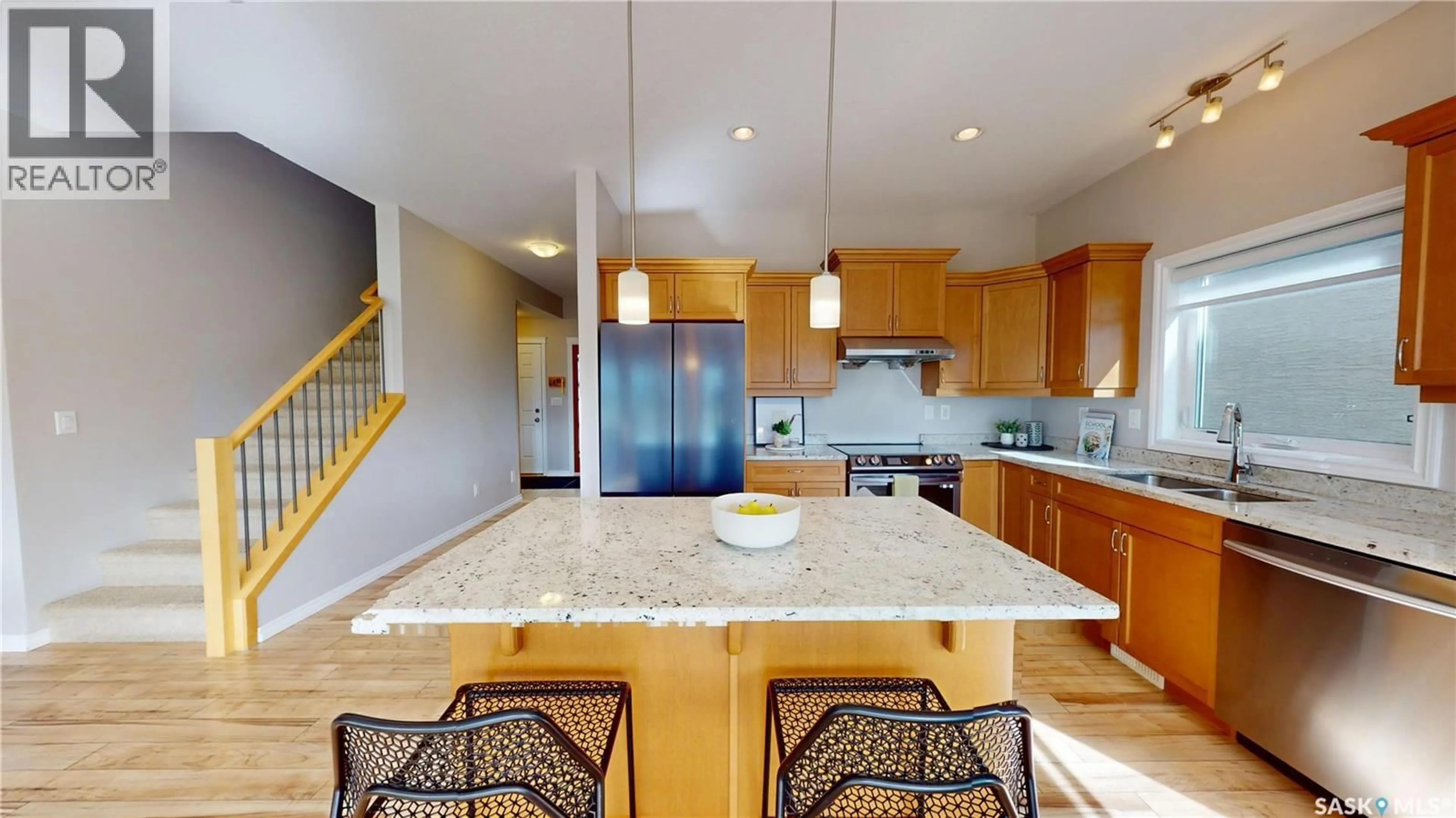 Open concept kitchen, ceramic/tile floor for 242 WHALLEY CRESCENT, Saskatoon Saskatchewan S7T0N9