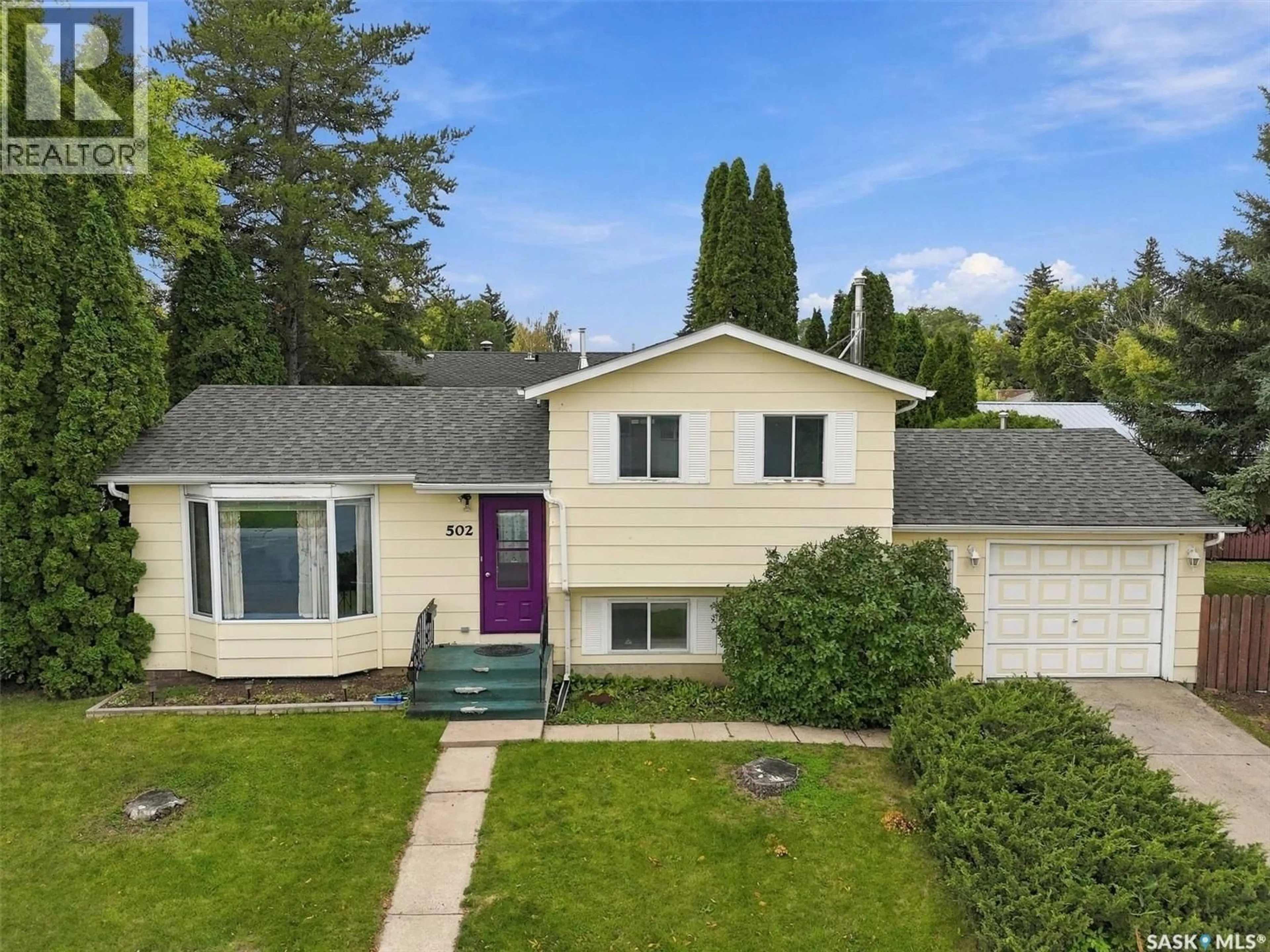 A pic from outside/outdoor area/front of a property/back of a property/a pic from drone, street for 502 MICHENER WAY, Saskatoon Saskatchewan S7L5V4