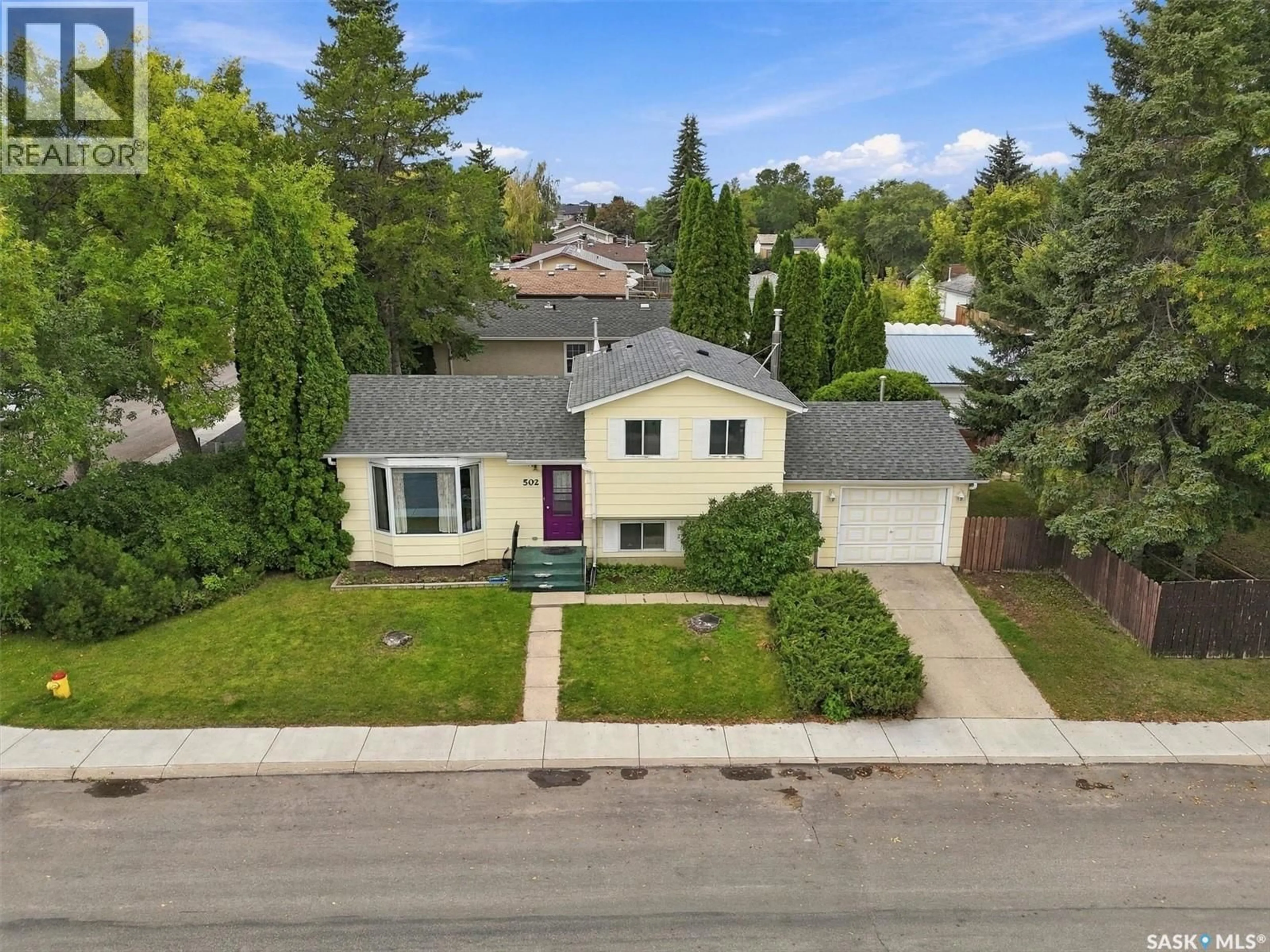 A pic from outside/outdoor area/front of a property/back of a property/a pic from drone, street for 502 MICHENER WAY, Saskatoon Saskatchewan S7L5V4