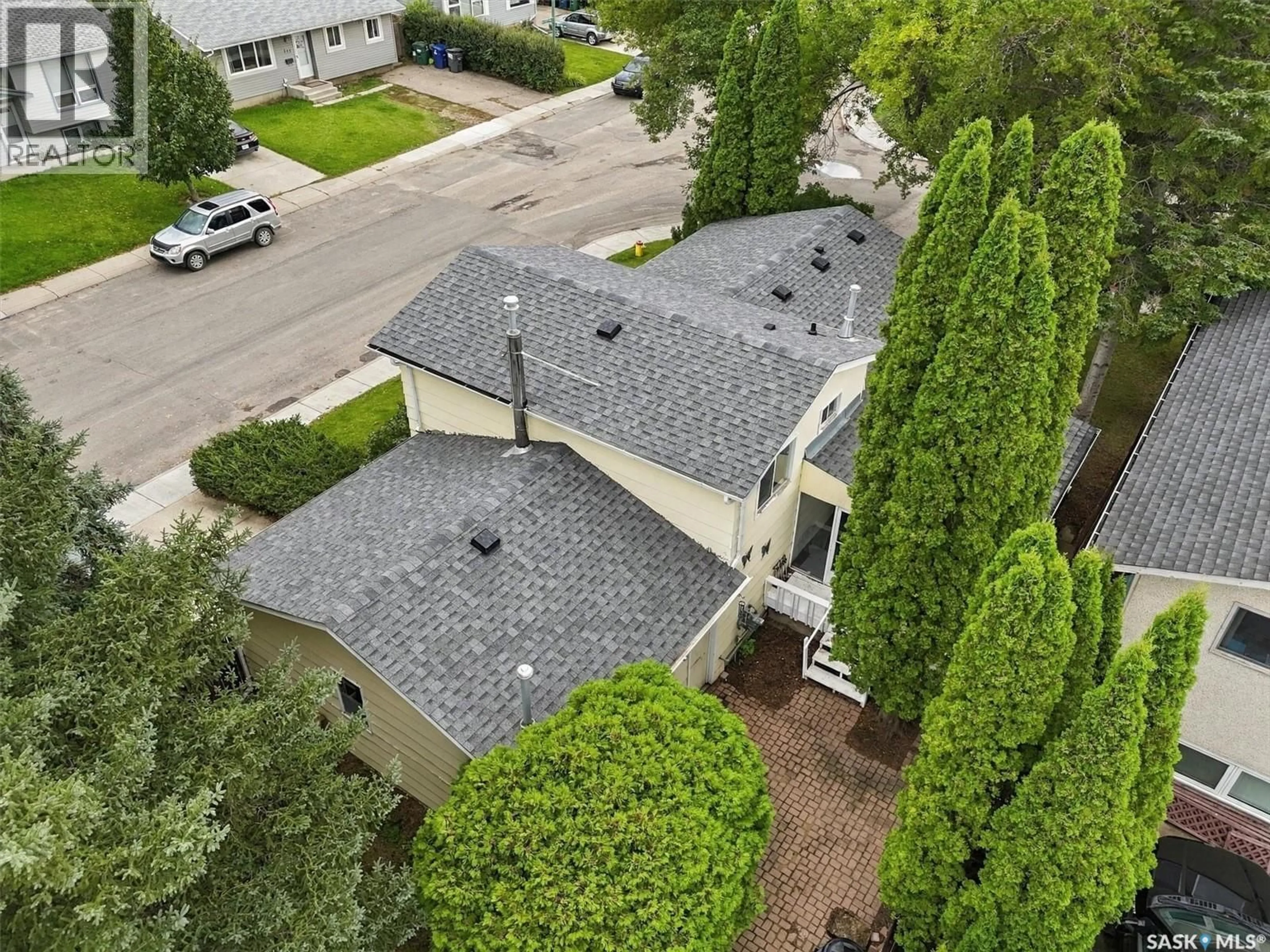 A pic from outside/outdoor area/front of a property/back of a property/a pic from drone, street for 502 MICHENER WAY, Saskatoon Saskatchewan S7L5V4
