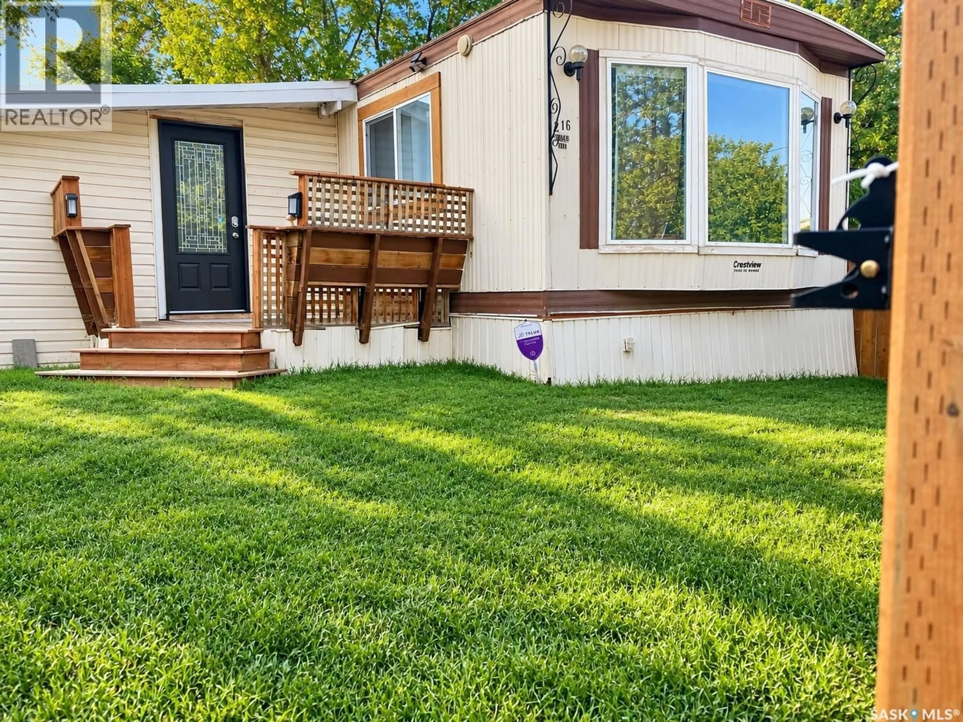Home with vinyl exterior material, mountain view for 216 - 1524 RAYNER AVENUE, Saskatoon Saskatchewan S7N1Y1