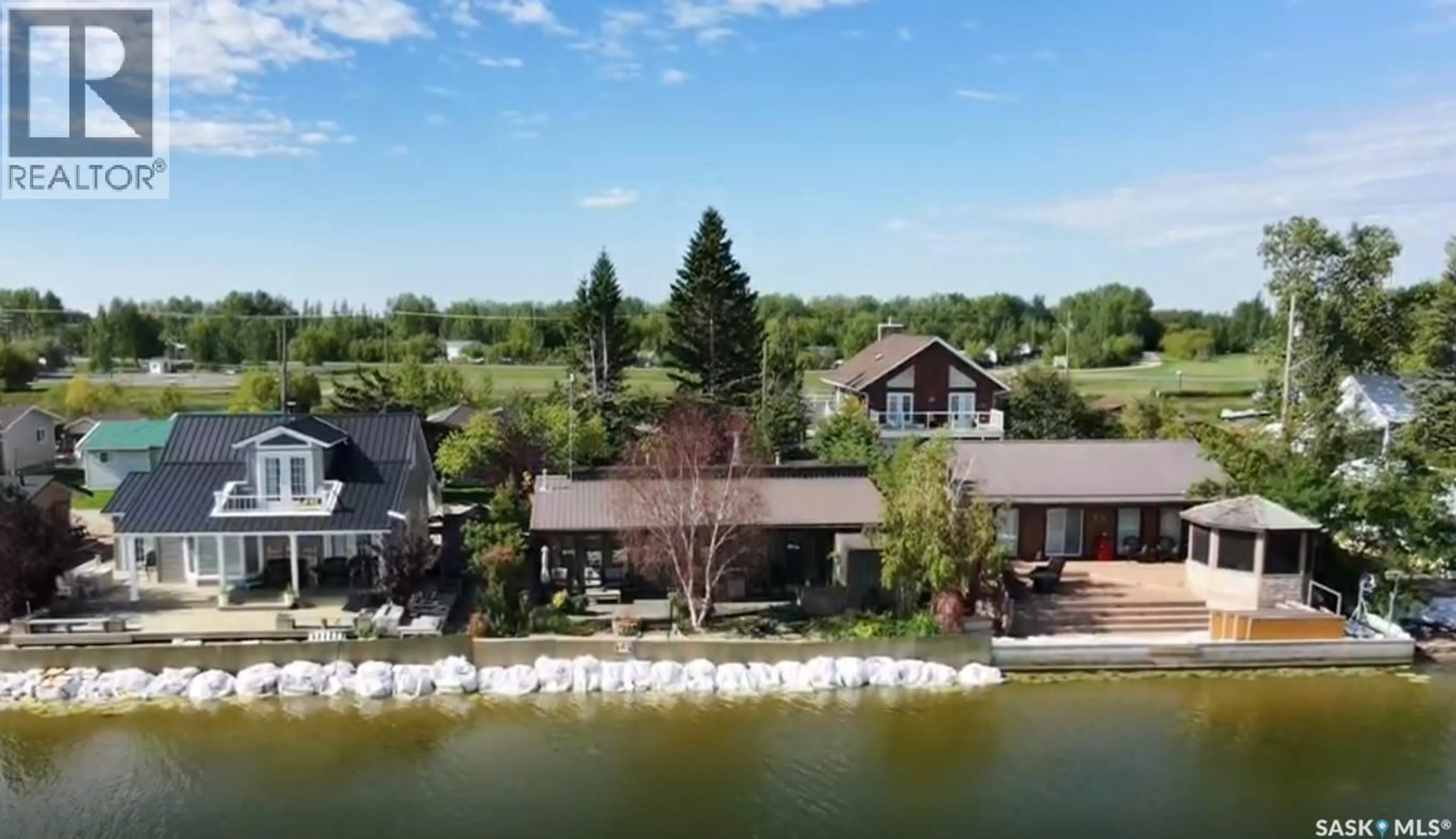 A pic from outside/outdoor area/front of a property/back of a property/a pic from drone, water/lake/river/ocean view for 122 LAKESHORE LANE, Leslie Beach Saskatchewan S0A1A0