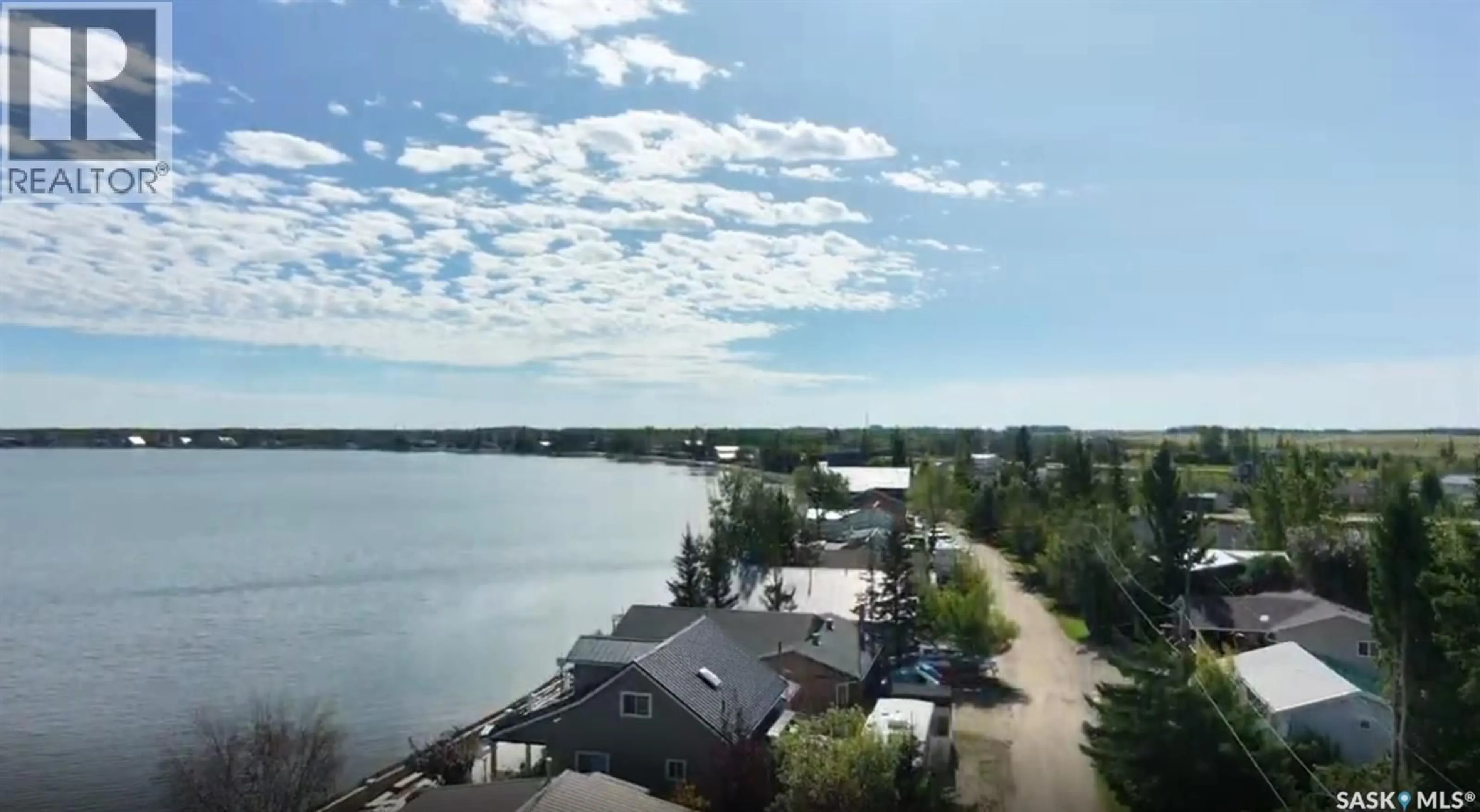 A pic from outside/outdoor area/front of a property/back of a property/a pic from drone, water/lake/river/ocean view for 122 LAKESHORE LANE, Leslie Beach Saskatchewan S0A1A0