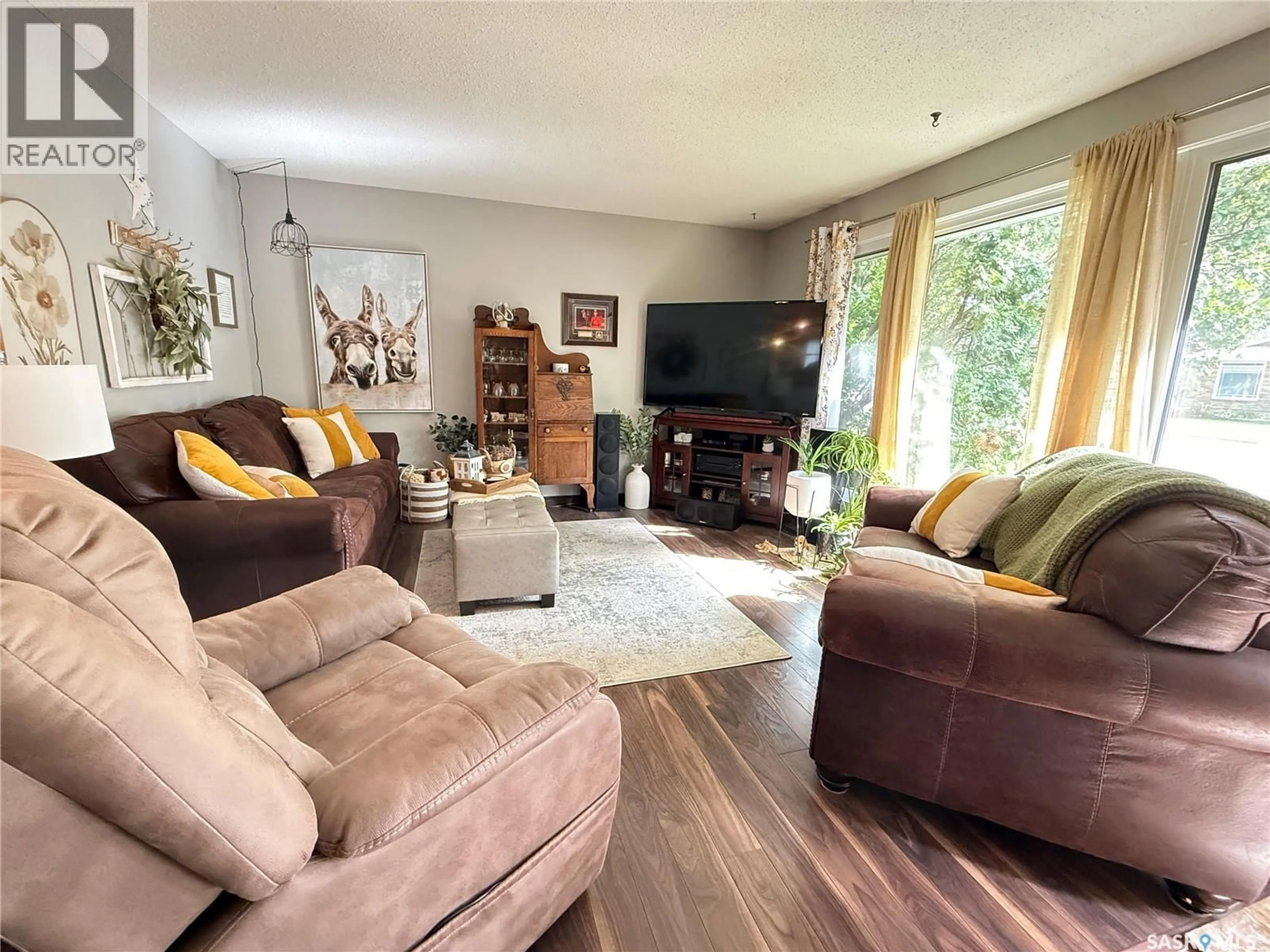 Living room with furniture, unknown for 1709 EAGLESHAM AVENUE, Weyburn Saskatchewan S4H2W8