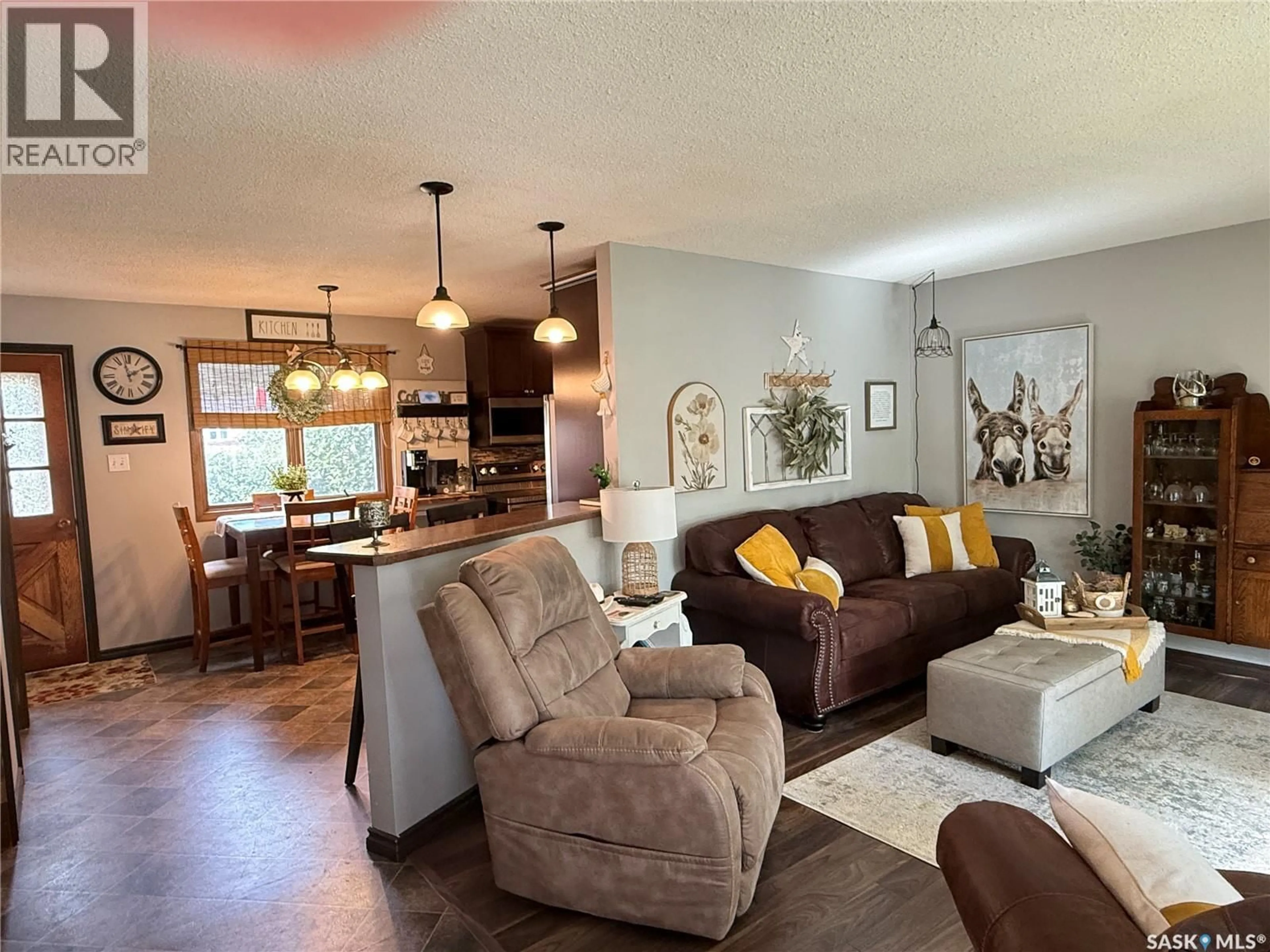 Living room with furniture, unknown for 1709 EAGLESHAM AVENUE, Weyburn Saskatchewan S4H2W8