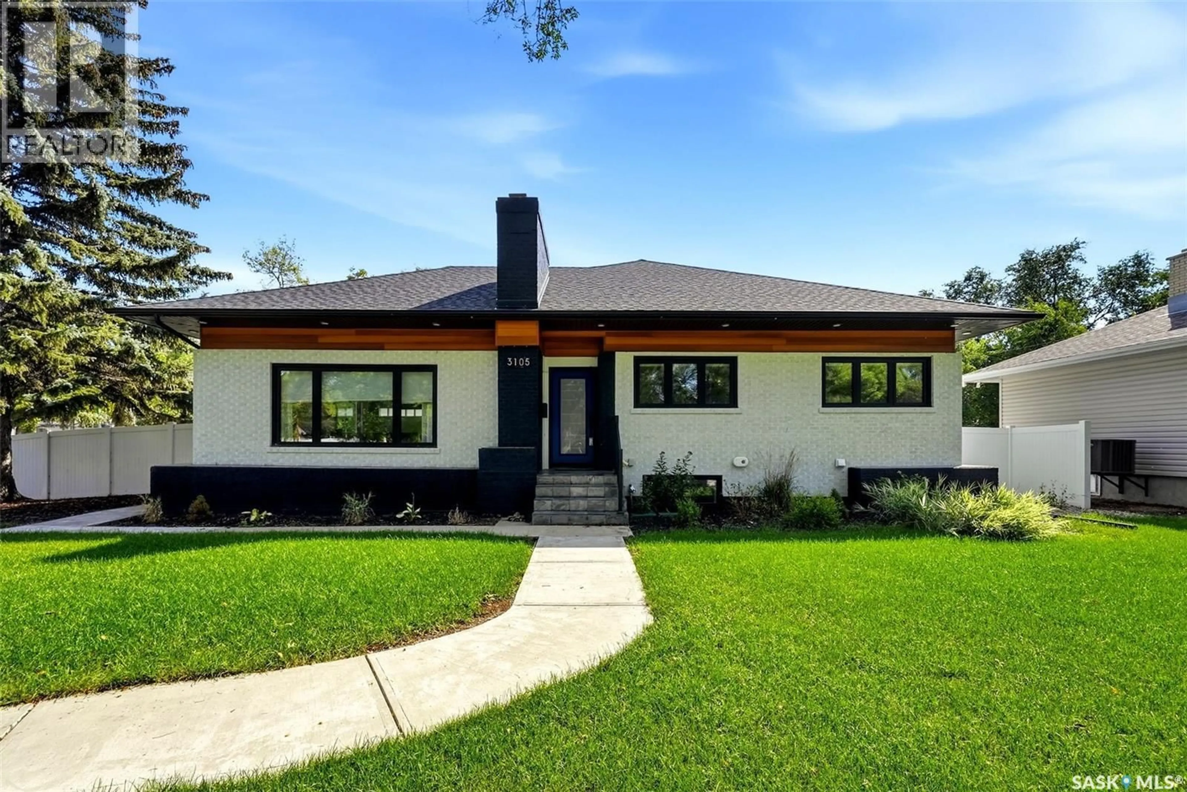 Home with brick exterior material, street for 3105 ASSINIBOINE AVENUE, Regina Saskatchewan S4S1E4