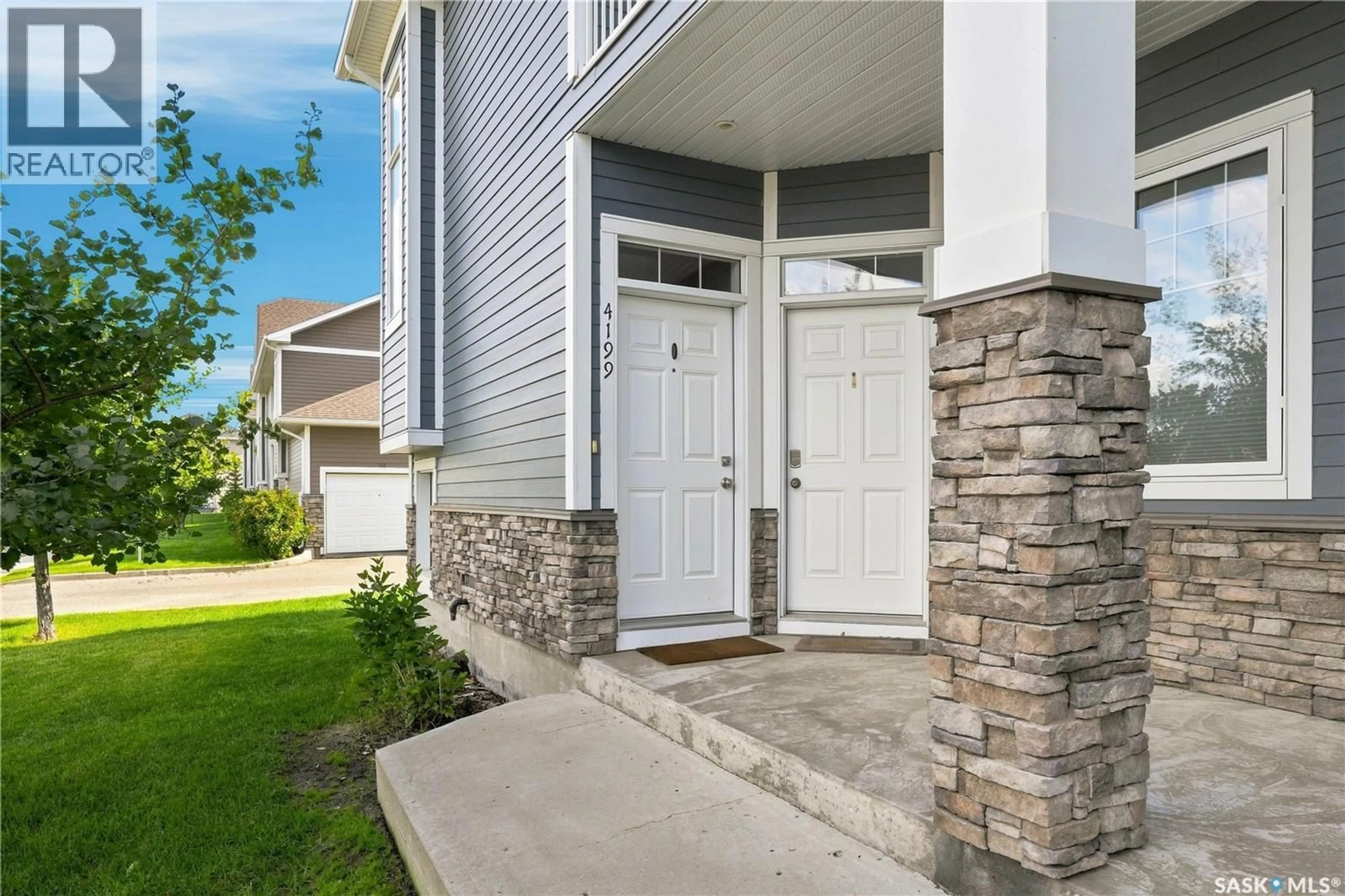 Home with vinyl exterior material, street for E - 4199 GREEN APPLE DRIVE, Regina Saskatchewan S4V1S1