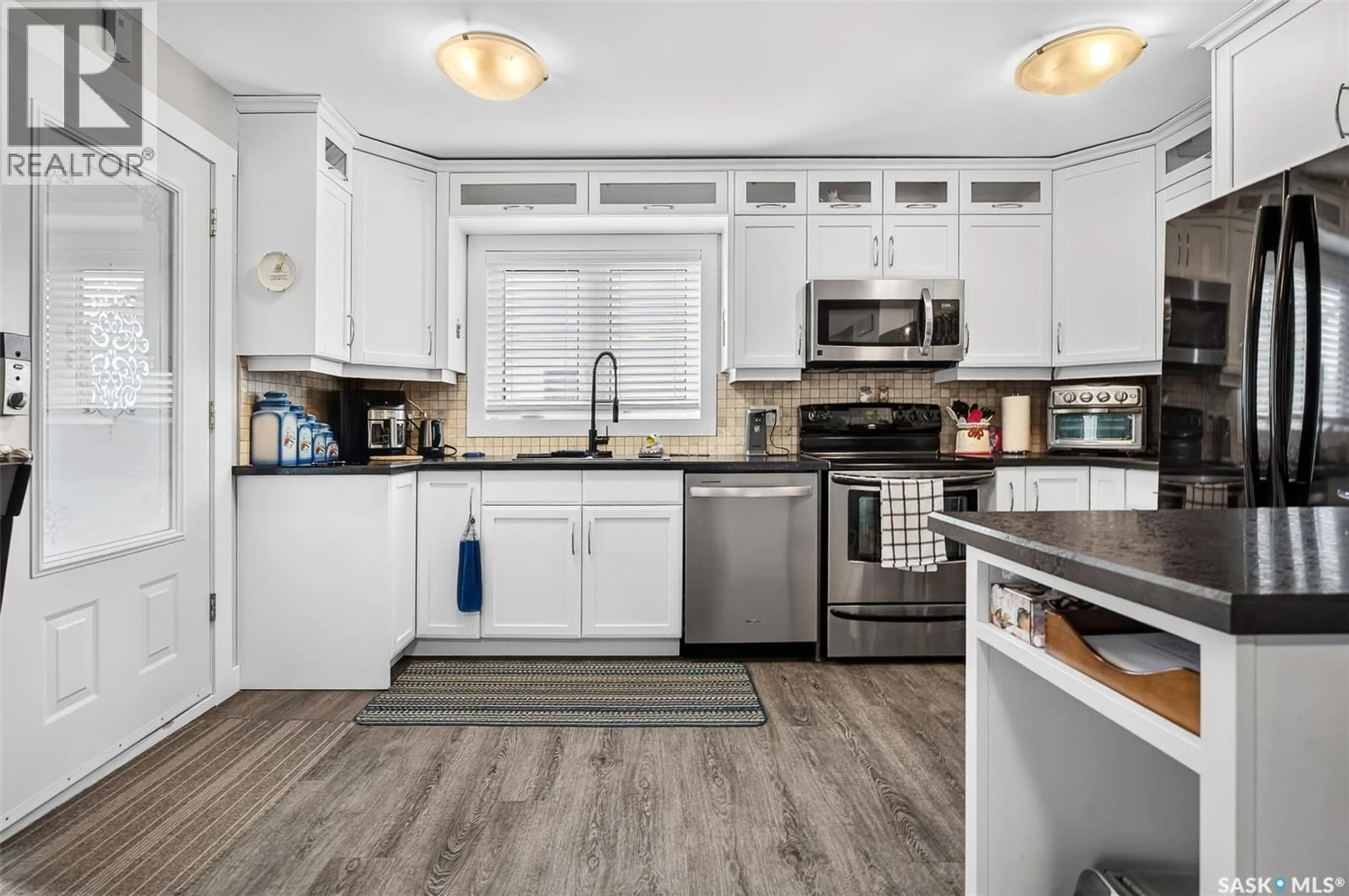 Open concept kitchen, unknown for 1242 4TH AVENUE, Moose Jaw Saskatchewan S6H1J4