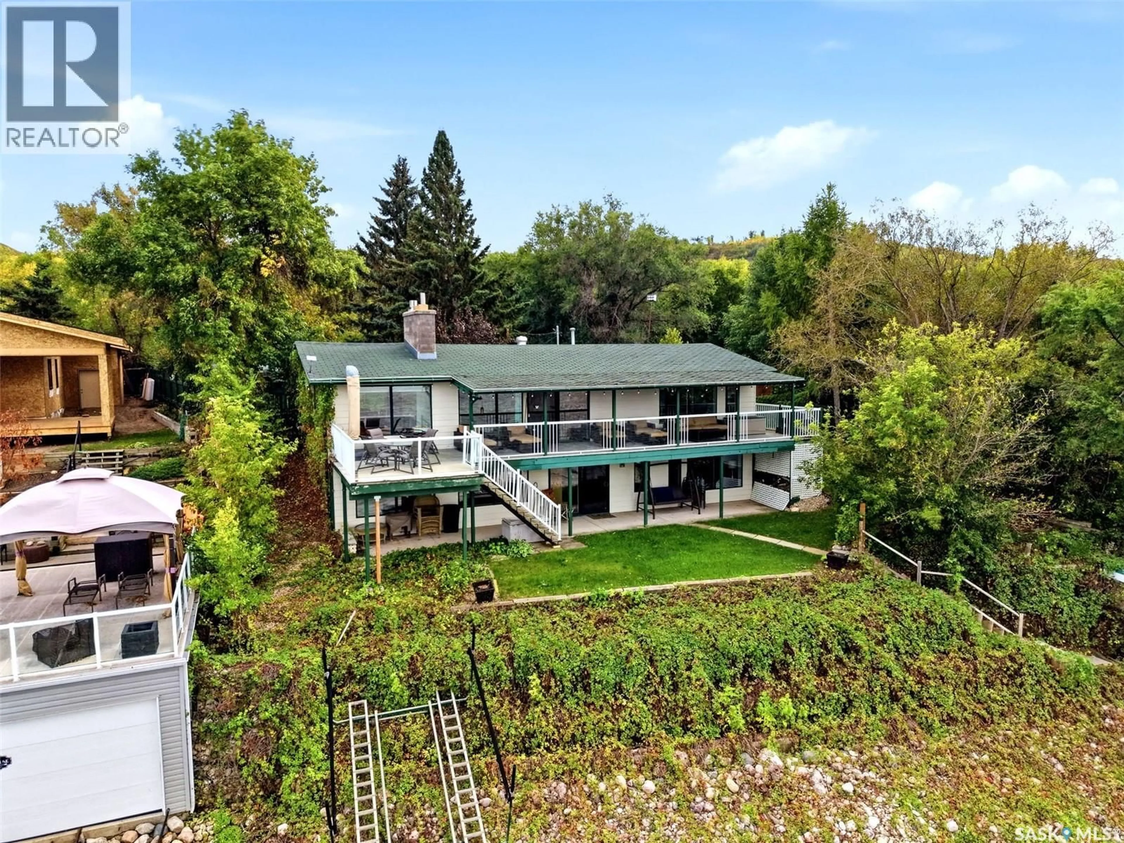 A pic from outside/outdoor area/front of a property/back of a property/a pic from drone, unknown for 46 BARTLETT PLACE, Echo Lake Saskatchewan S0G1S0