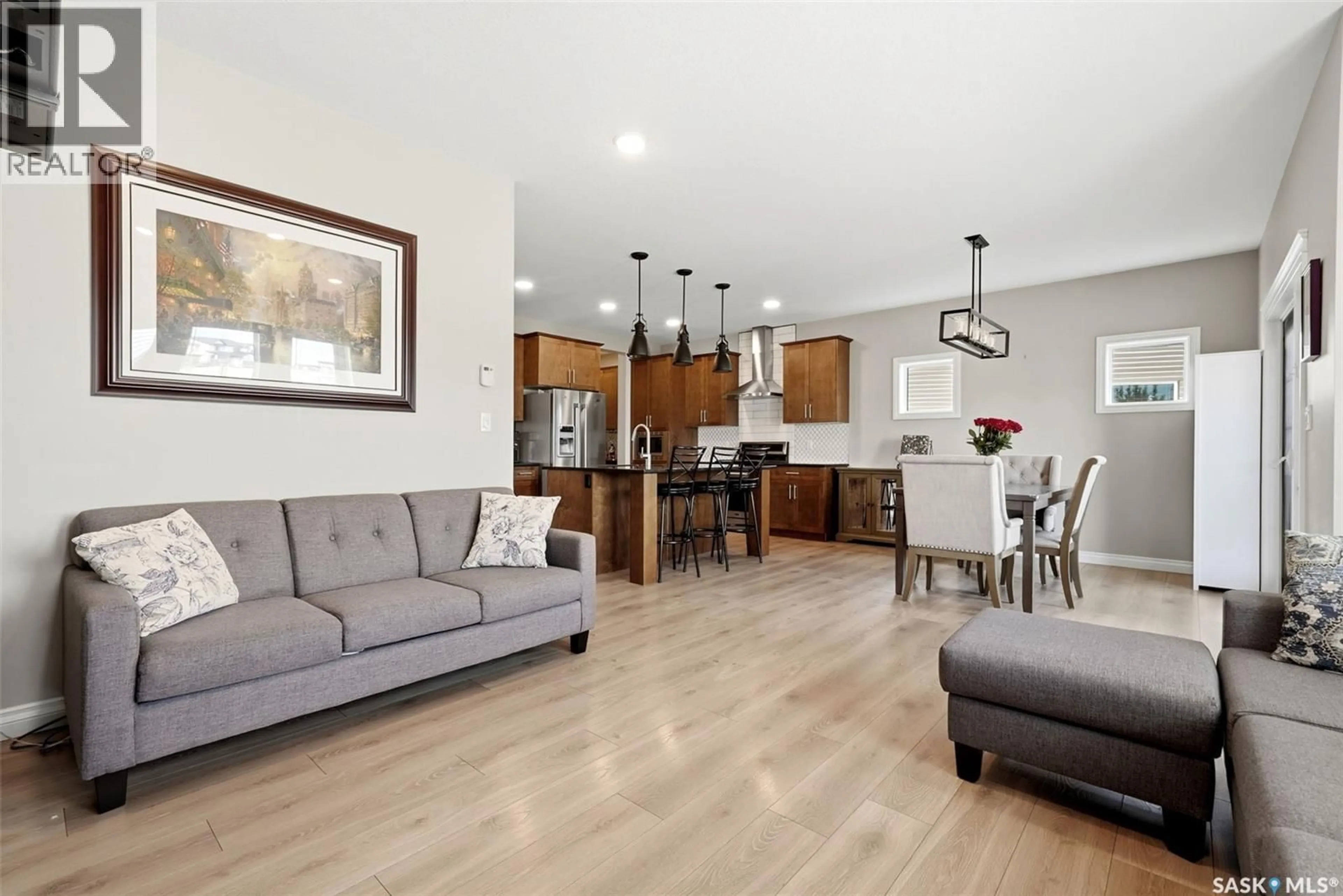 Open concept kitchen, wood/laminate floor for 5148 GREEN CRESCENT, Regina Saskatchewan S4V3S9