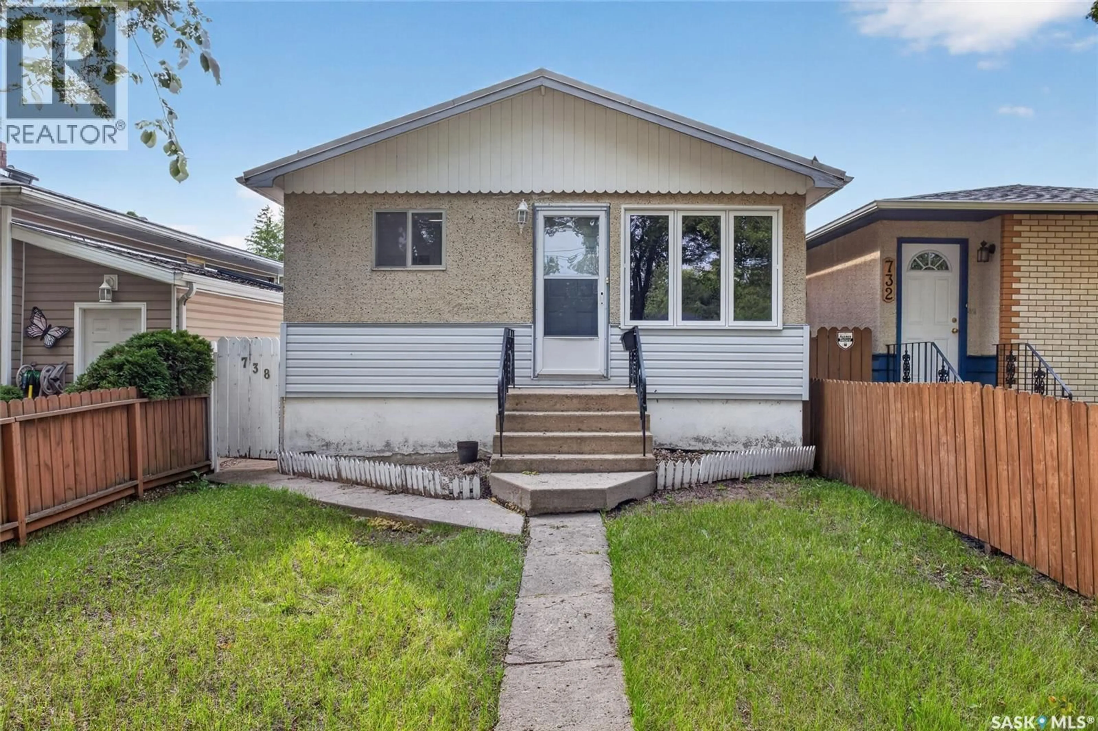 Home with vinyl exterior material, street for 738 QUEEN STREET, Regina Saskatchewan S4T4A3
