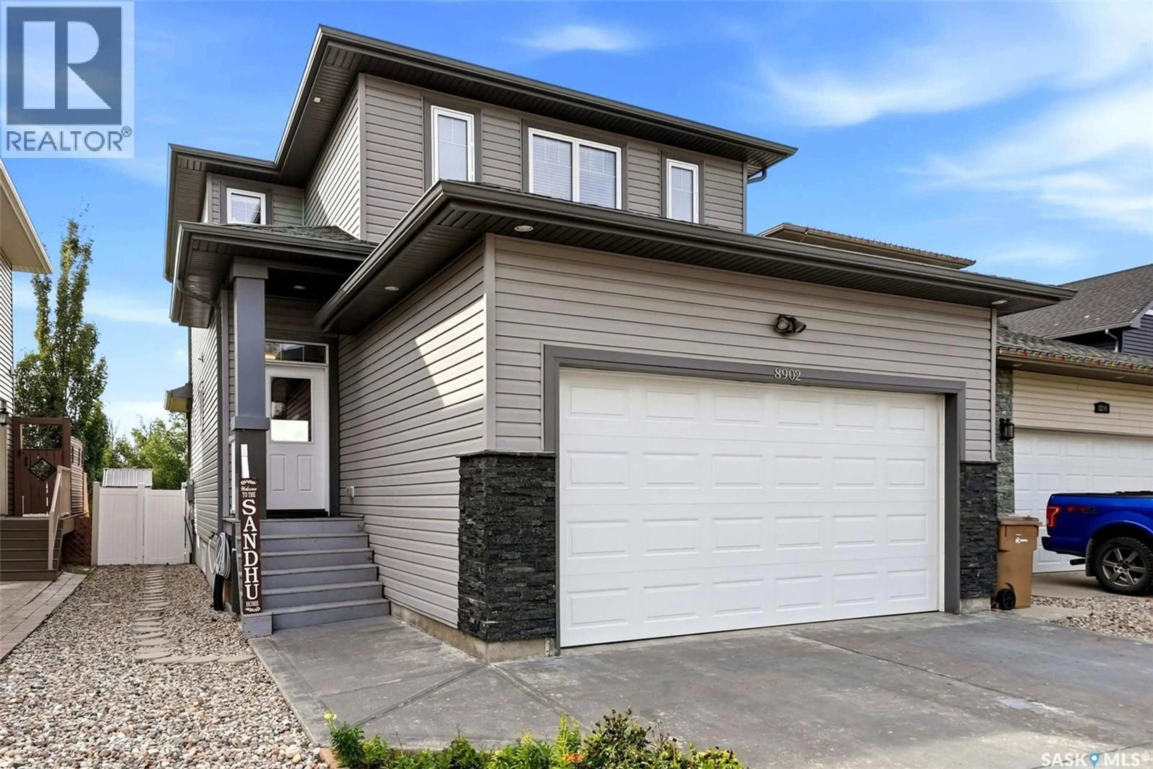 Home with vinyl exterior material, street for 8902 HERMAN CRESCENT, Regina Saskatchewan S4Y0C1