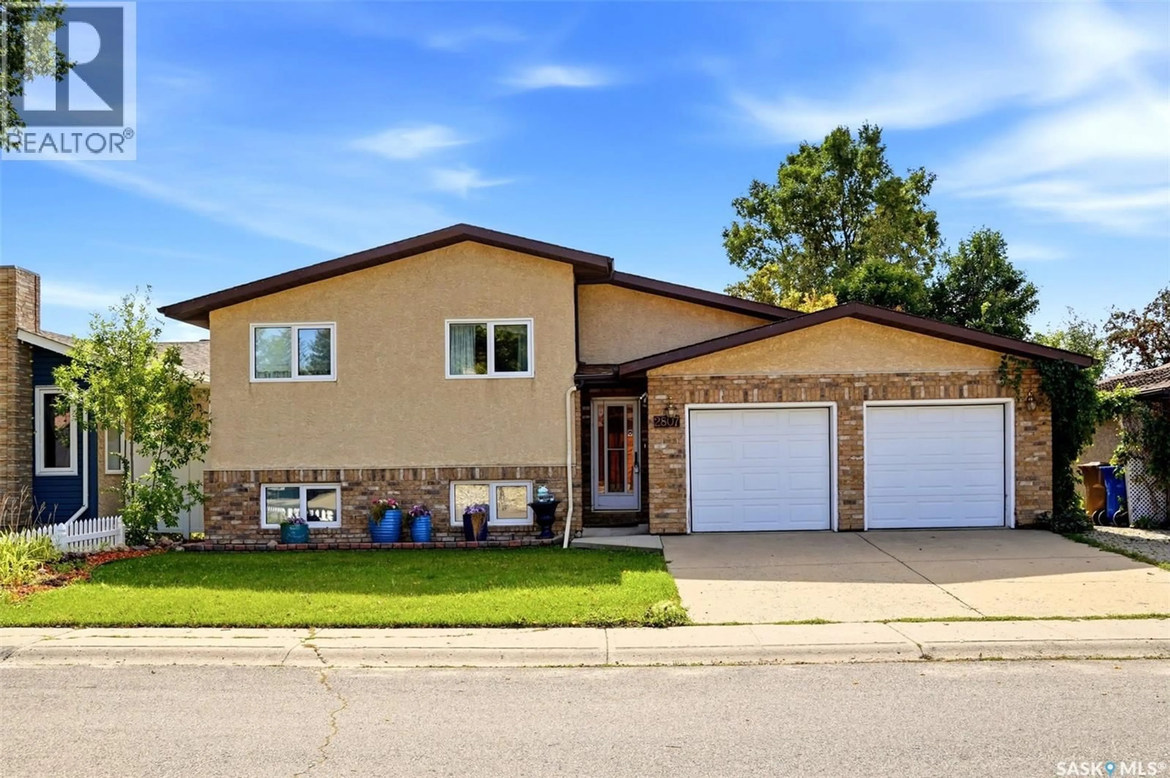 Home with brick exterior material, street for 2807 HOWELL DRIVE, Regina Saskatchewan S4N6G1