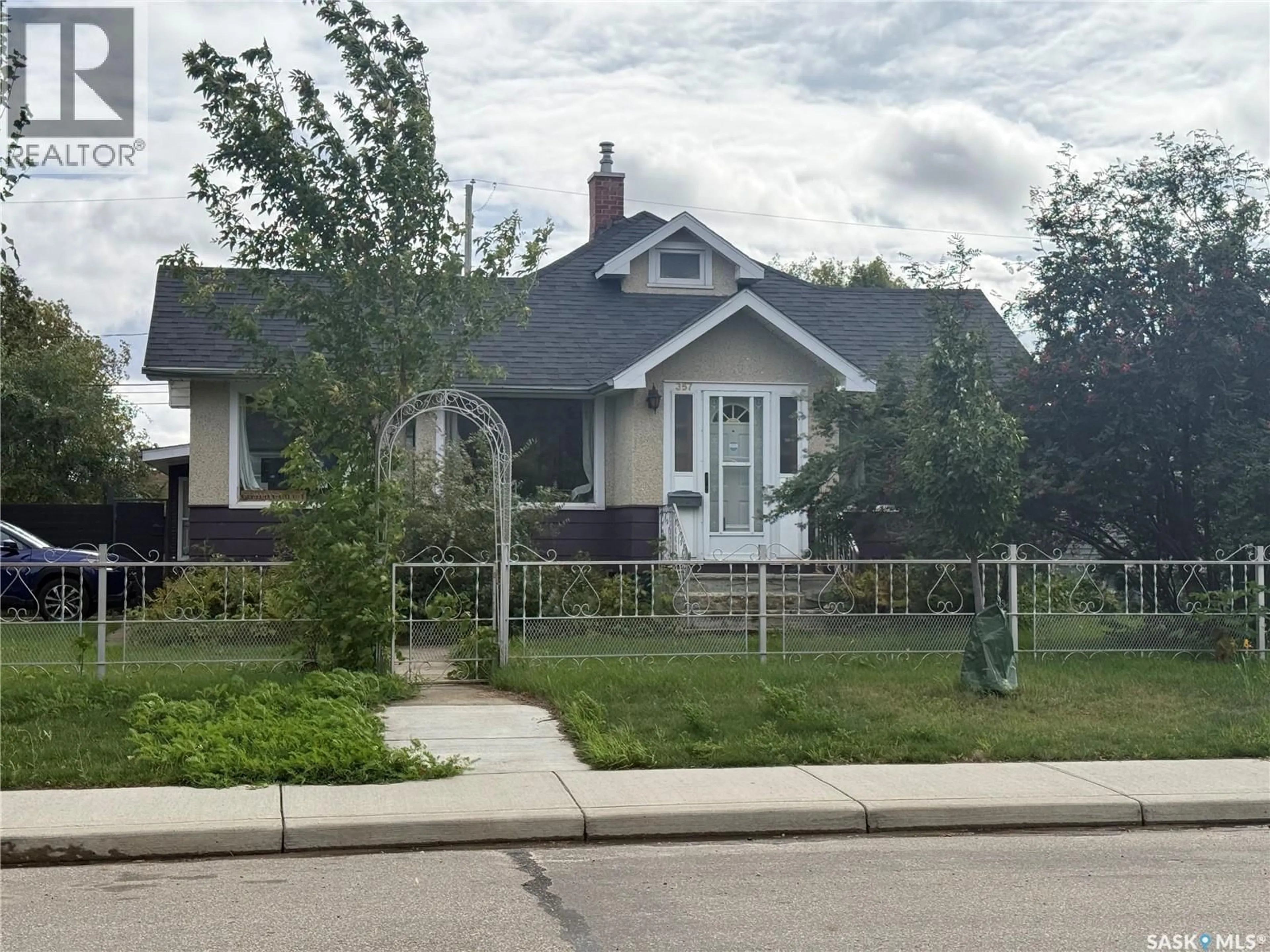 Home with vinyl exterior material, street for 357 12TH STREET, Prince Albert Saskatchewan S6V1C2
