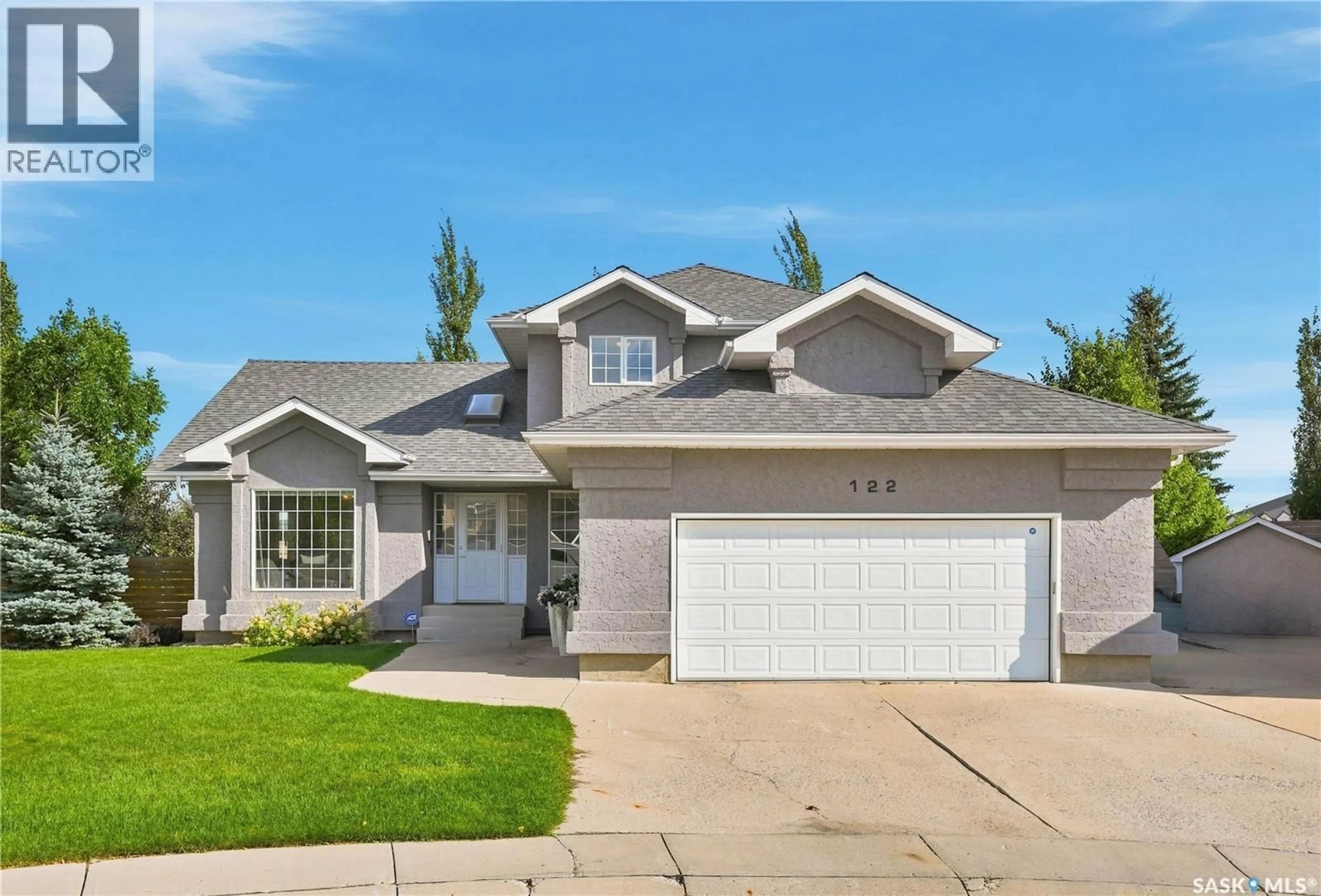 Home with vinyl exterior material, street for 122 LAVALEE PLACE, Saskatoon Saskatchewan S7J5K7