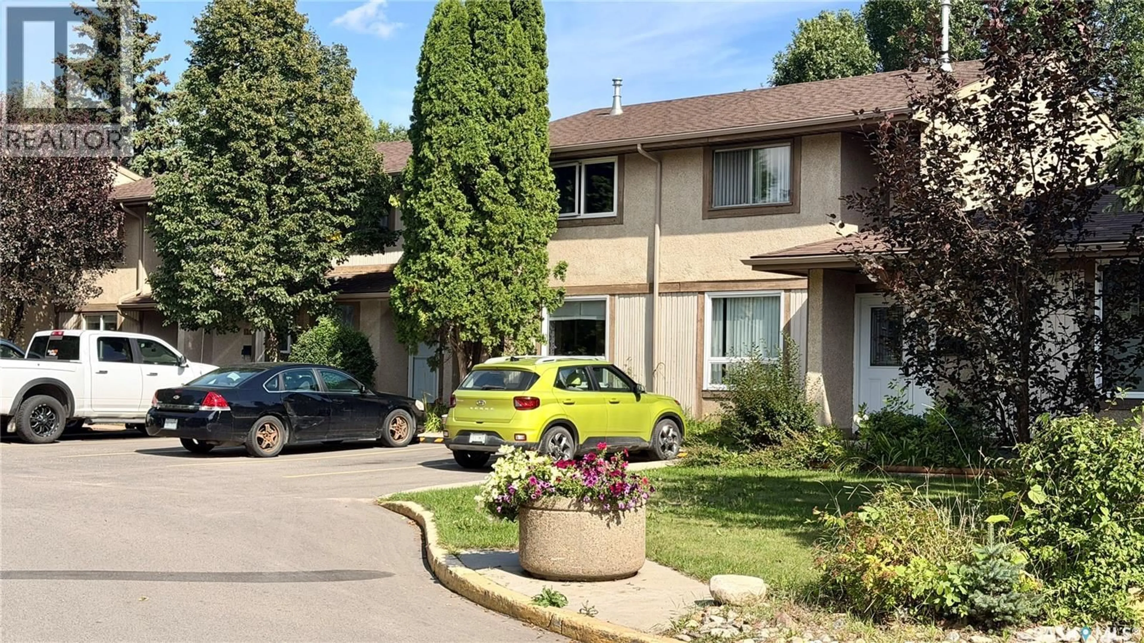 Patio, street for 1128 - 128 MCKERCHER DRIVE, Saskatoon Saskatchewan S7H4Y7