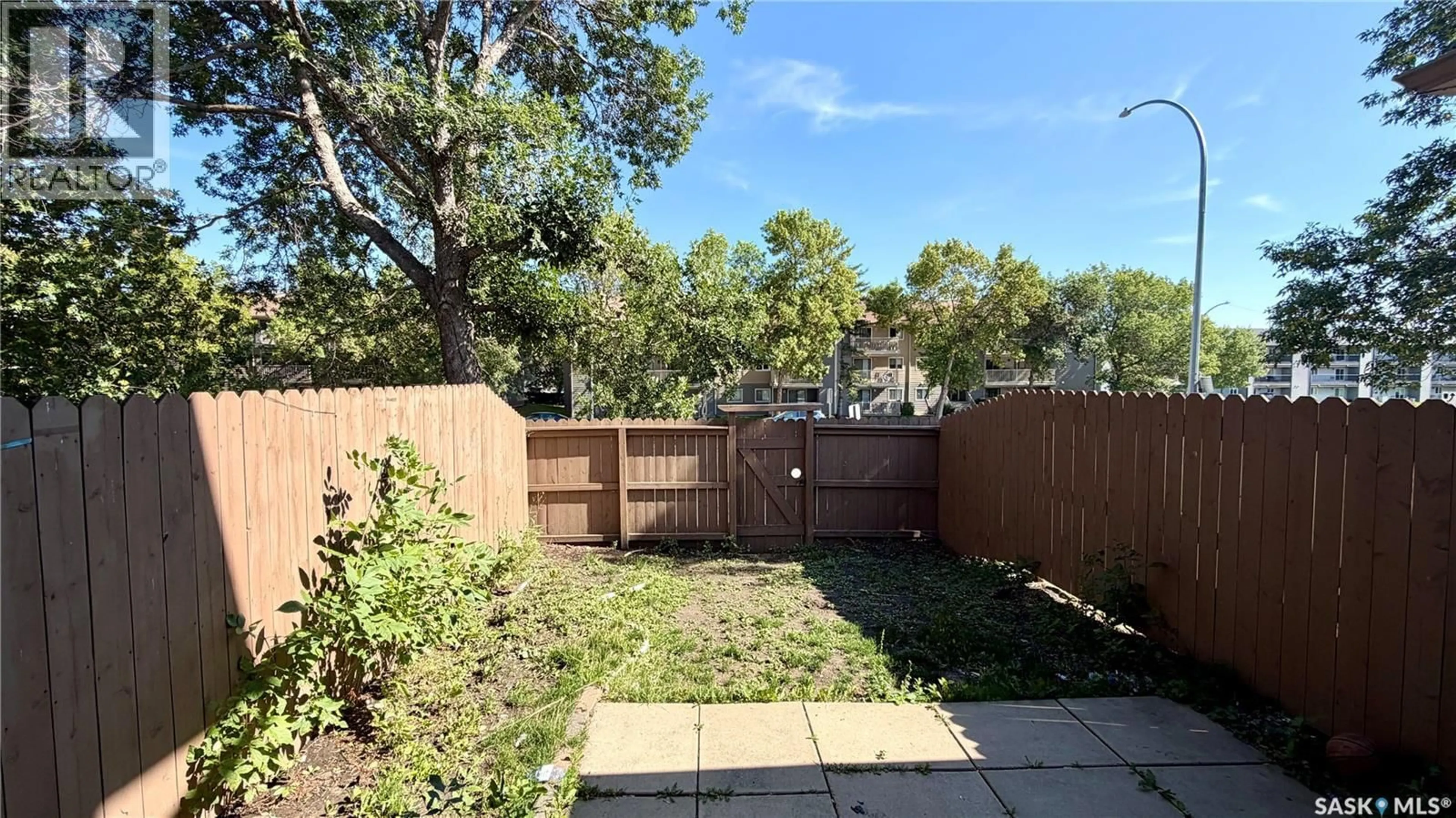 A pic from outside/outdoor area/front of a property/back of a property/a pic from drone, forest/trees view for 1128 - 128 MCKERCHER DRIVE, Saskatoon Saskatchewan S7H4Y7