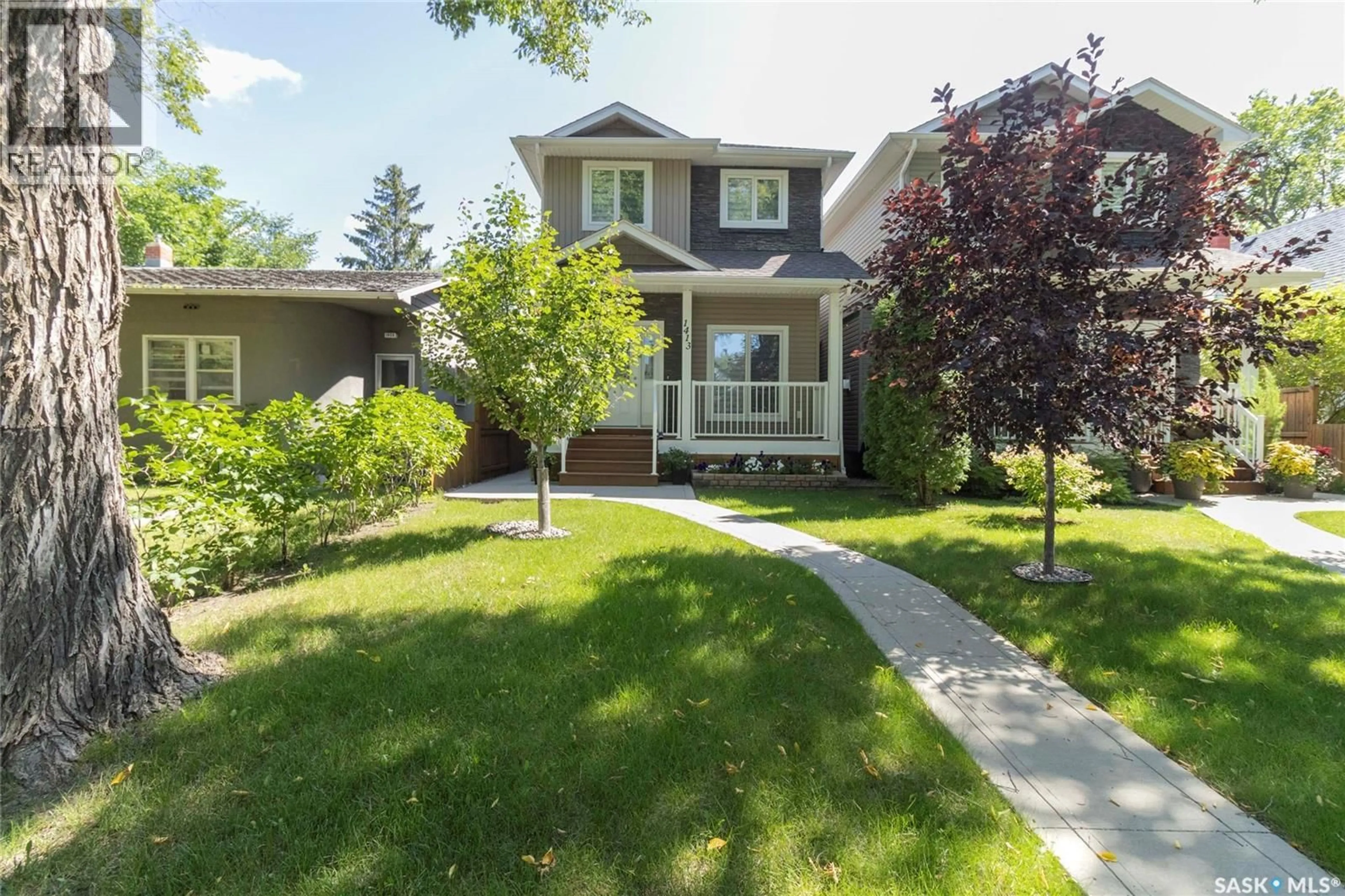 Home with vinyl exterior material, street for 1413 CAIRNS AVENUE, Saskatoon Saskatchewan S7H2H3