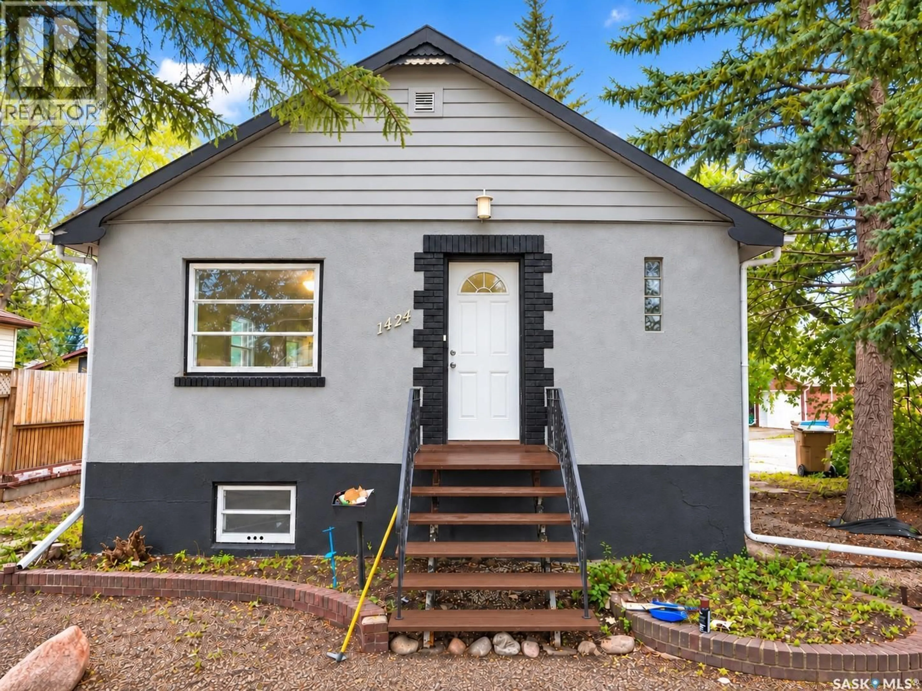 Home with vinyl exterior material, street for 1424 FORGET STREET, Regina Saskatchewan S4T4Y3