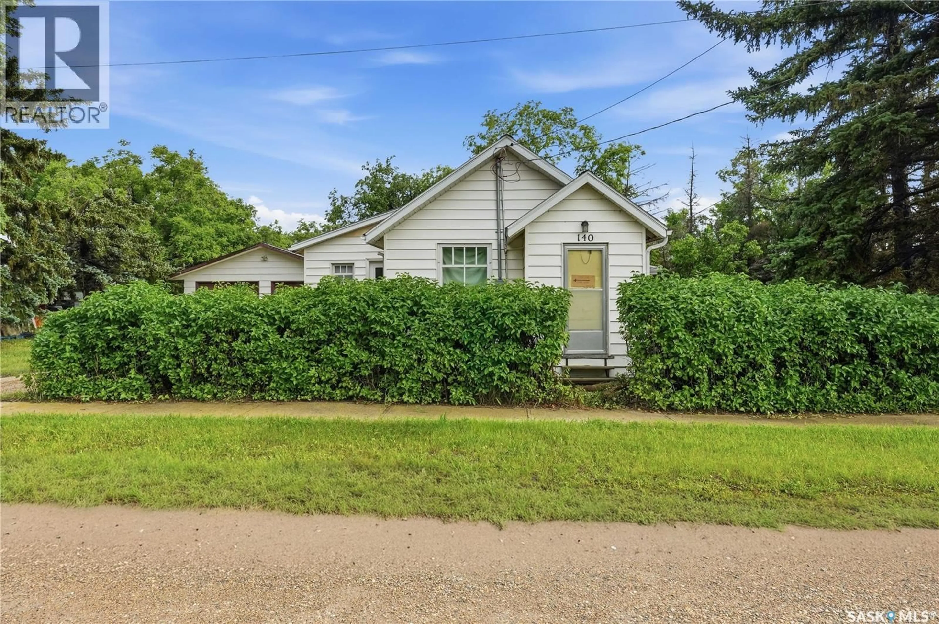 Home with vinyl exterior material, street for 140 1ST AVENUE, Chaplin Saskatchewan S0H0V0