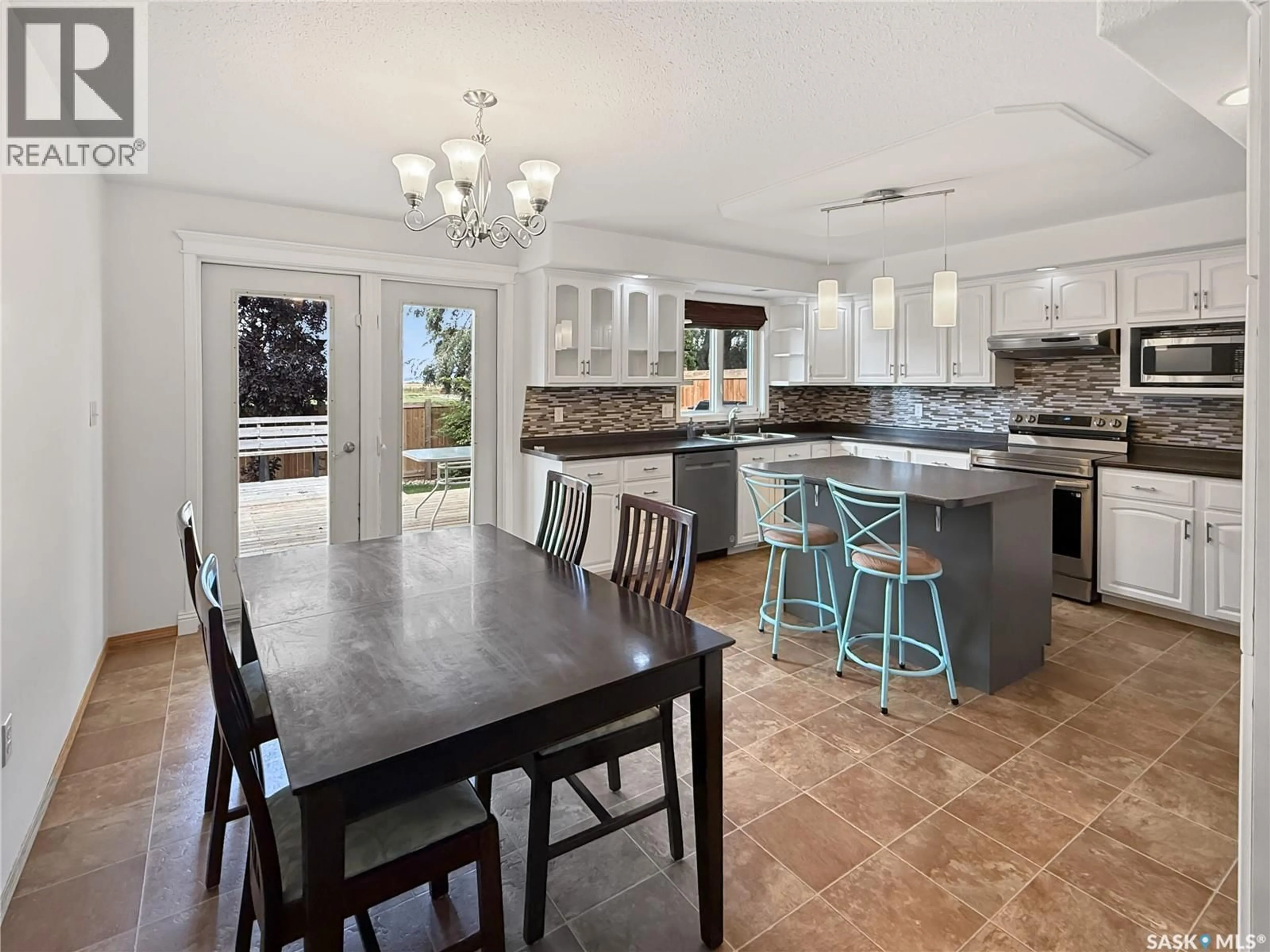 Open concept kitchen, ceramic/tile floor for 2523 BLUE JAY CRESCENT, North Battleford Saskatchewan S9A3Z3