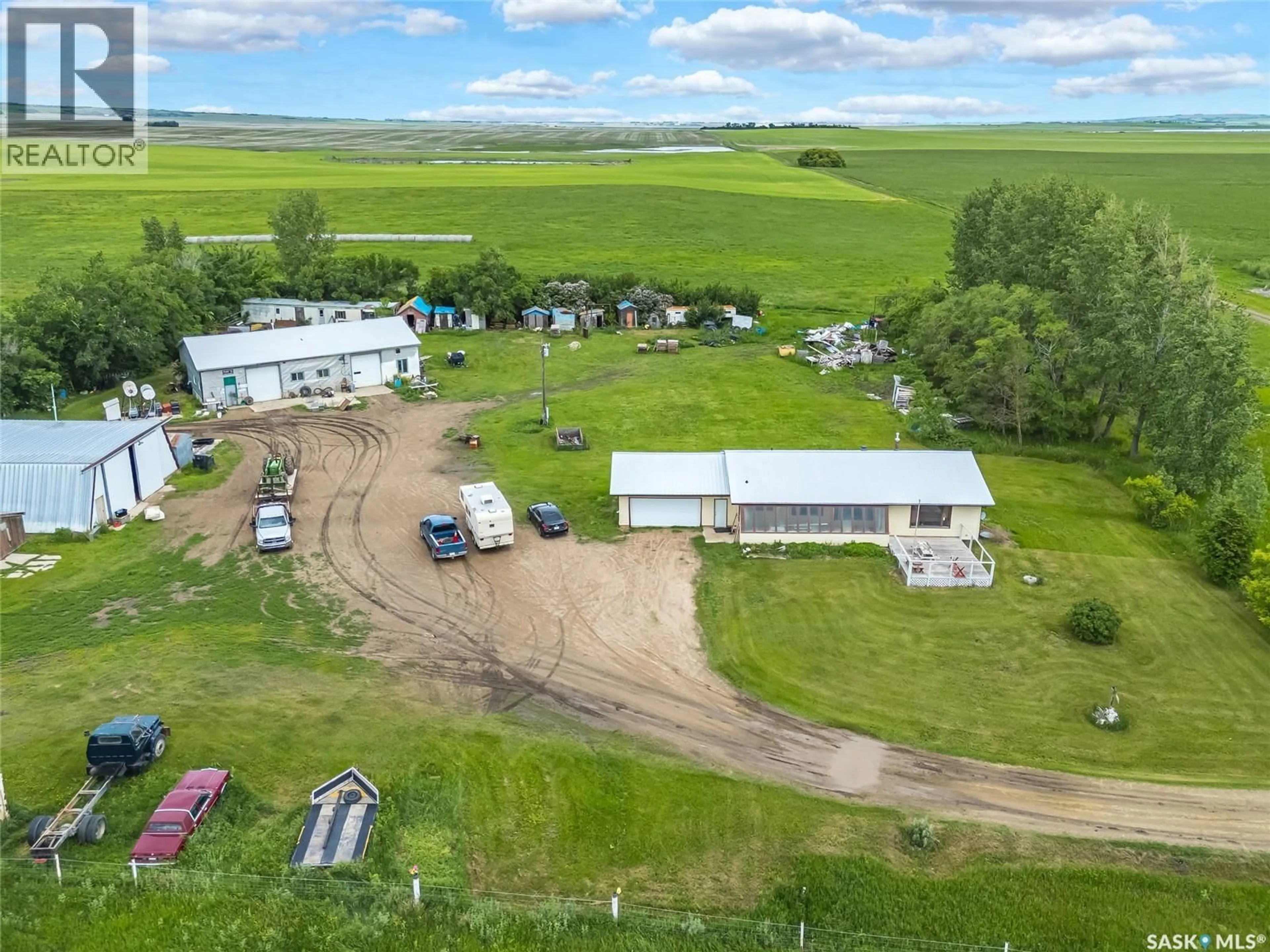 A pic from outside/outdoor area/front of a property/back of a property/a pic from drone, unknown for 46 HNATUK RD, Aberdeen No 373 Saskatchewan S7A0A8