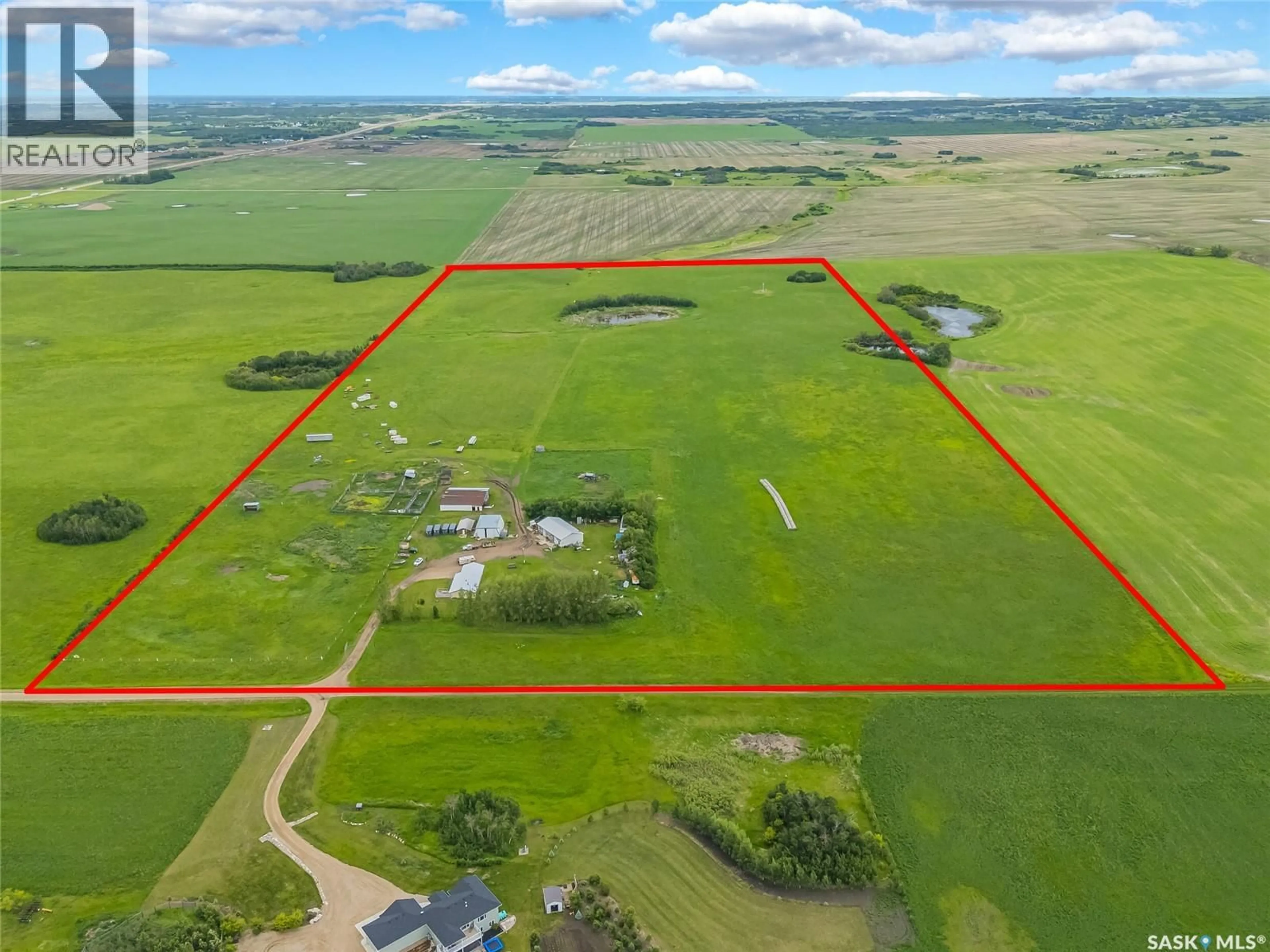 A pic from outside/outdoor area/front of a property/back of a property/a pic from drone, unknown for 46 HNATUK RD, Aberdeen No 373 Saskatchewan S7A0A8