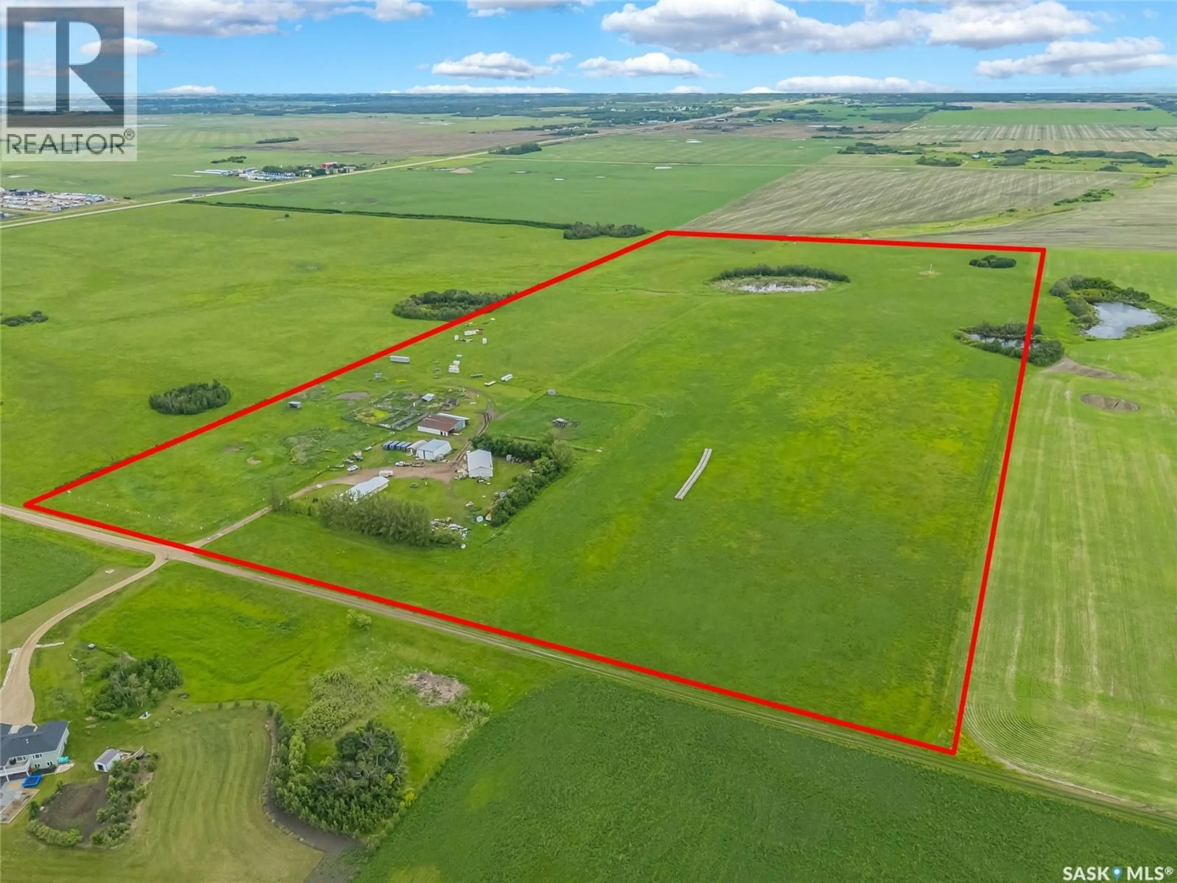 A pic from outside/outdoor area/front of a property/back of a property/a pic from drone, building for 46 HNATUK RD, Aberdeen No 373 Saskatchewan S7A0A8