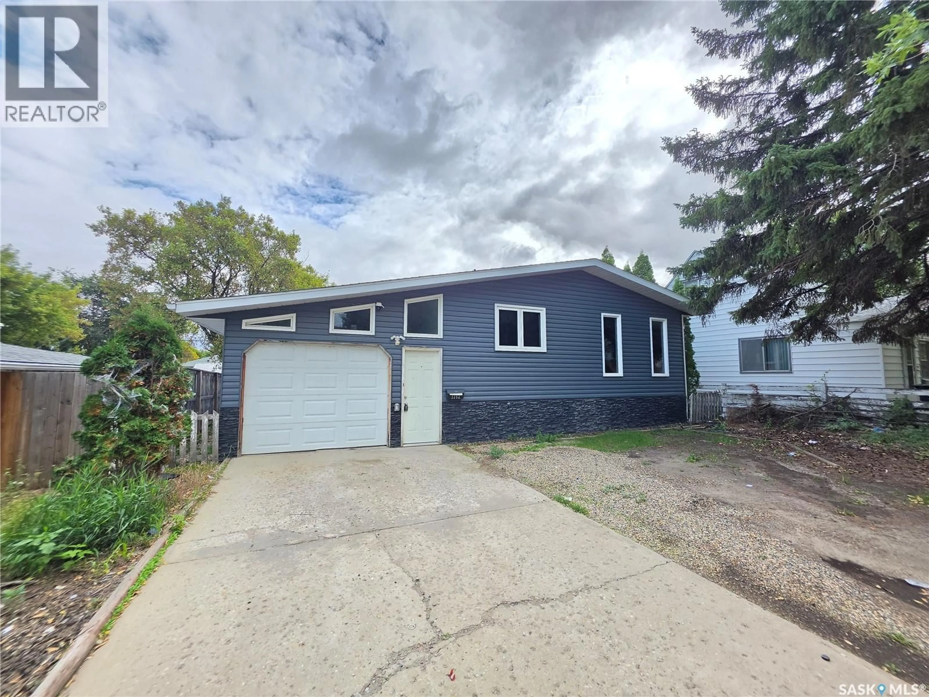 Home with vinyl exterior material, street for 1162 106TH STREET, North Battleford Saskatchewan S9A1W9