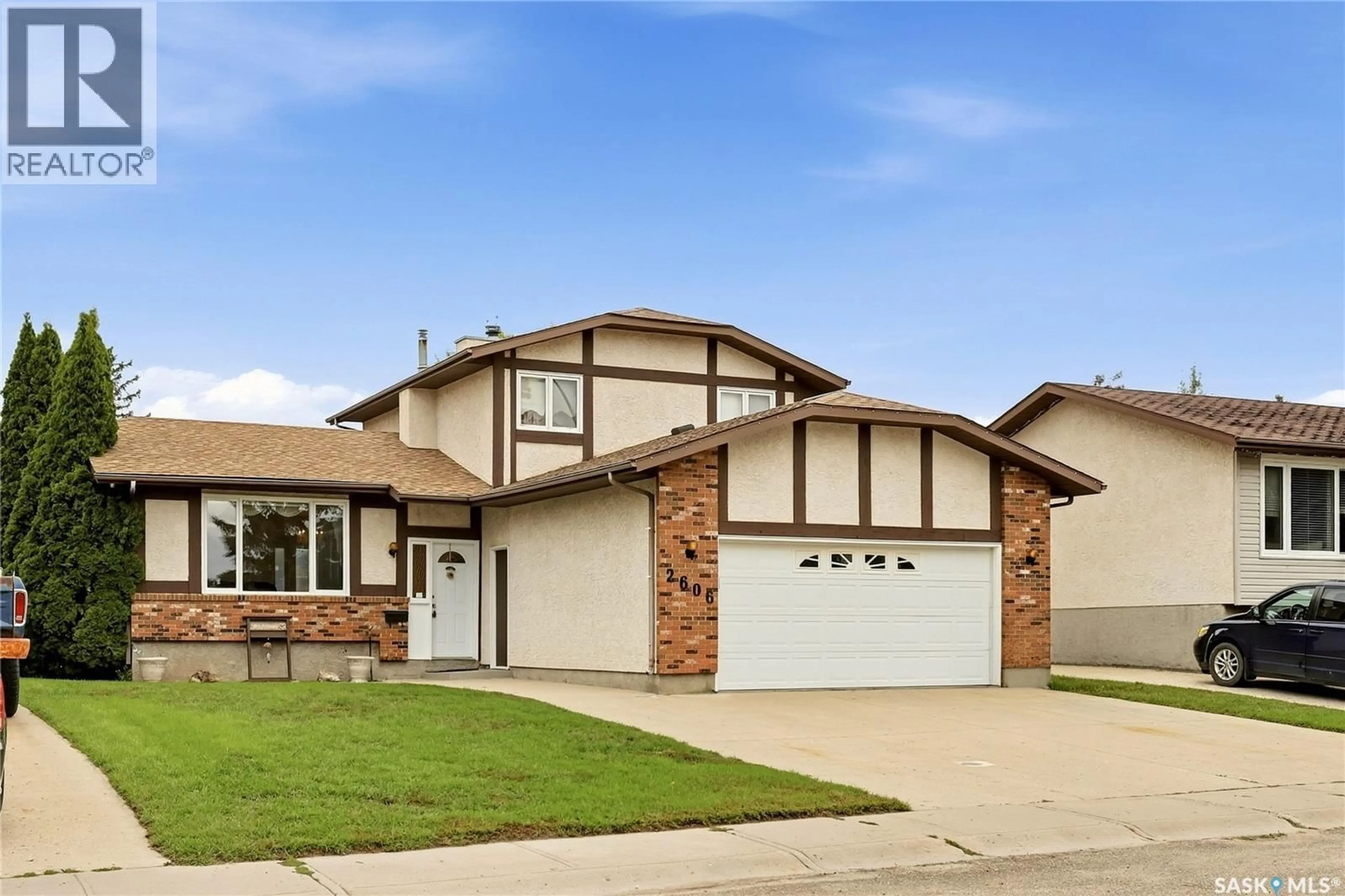 Home with vinyl exterior material, street for E - 2606 NEFF ROAD, Regina Saskatchewan S4V1K5